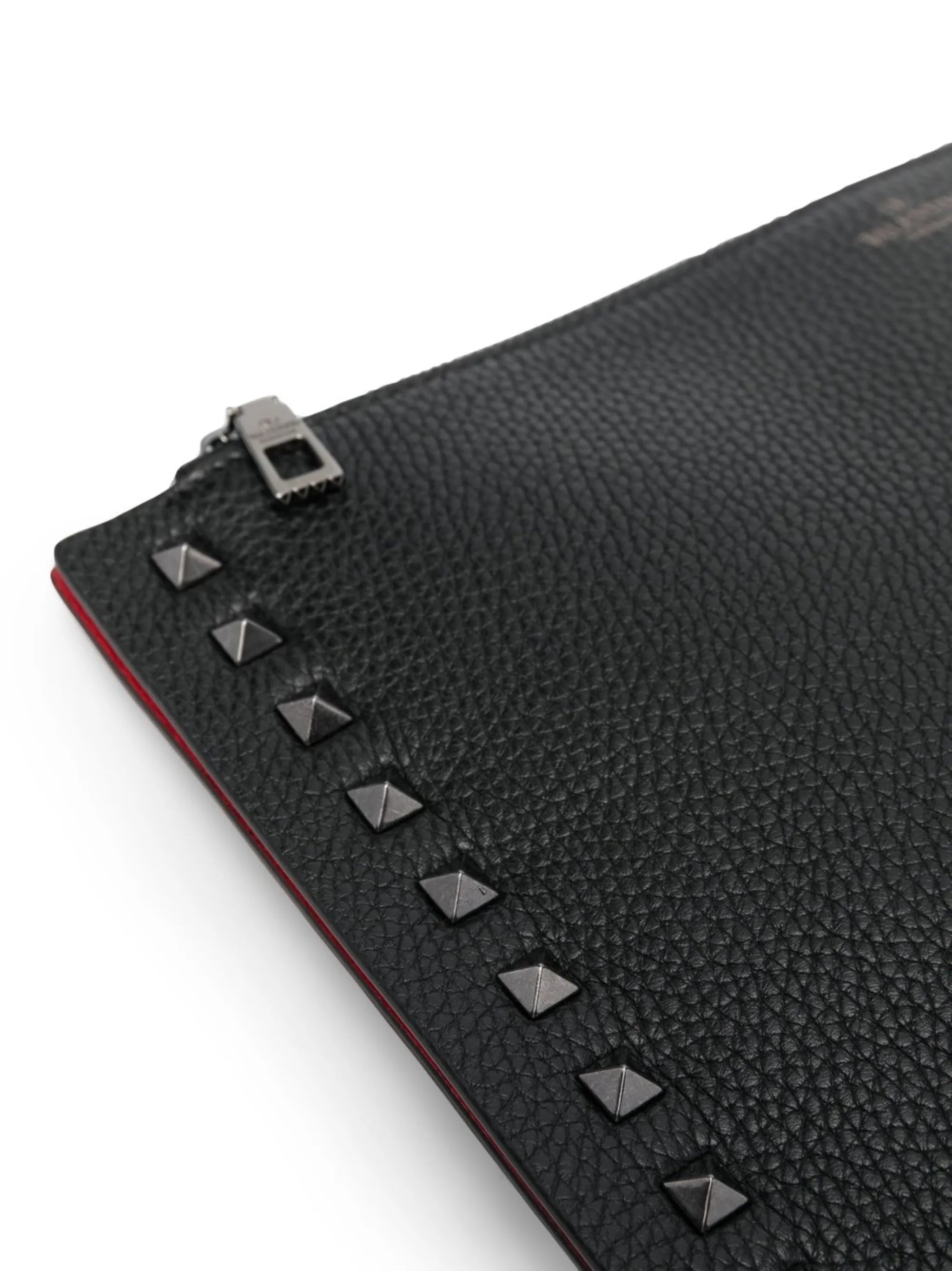 studded leather clutch-bag