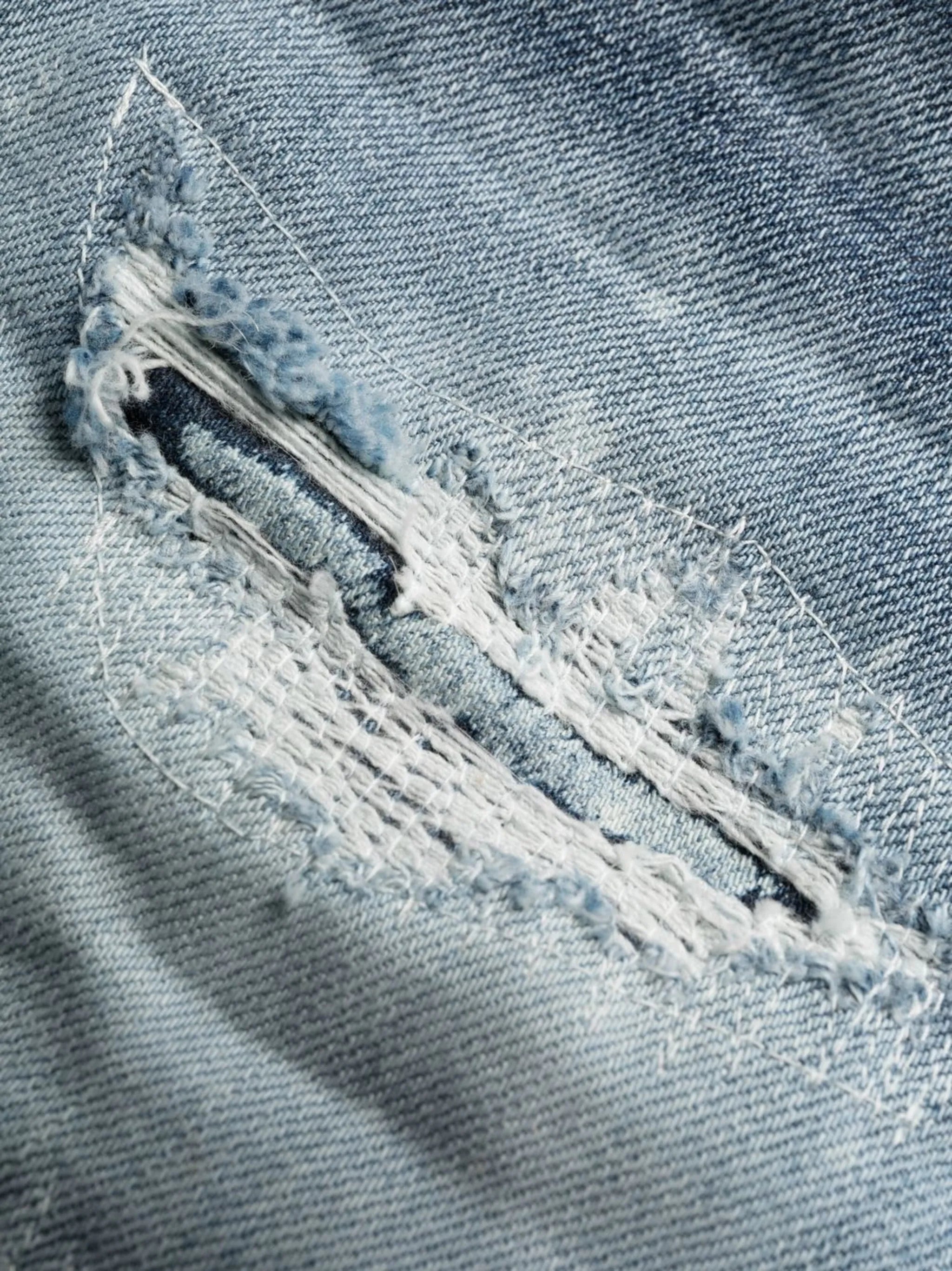 distressed-effect slim jeans