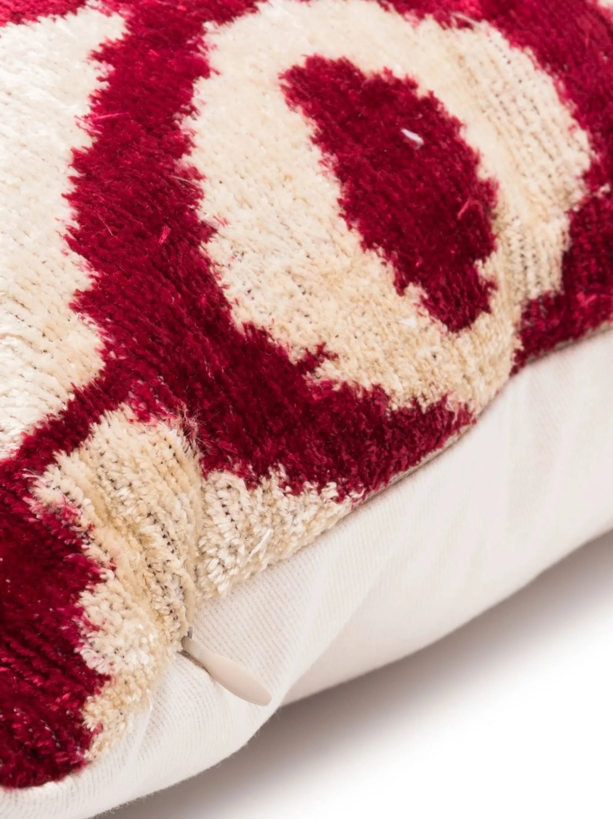 geometric-patterned velvet cushion