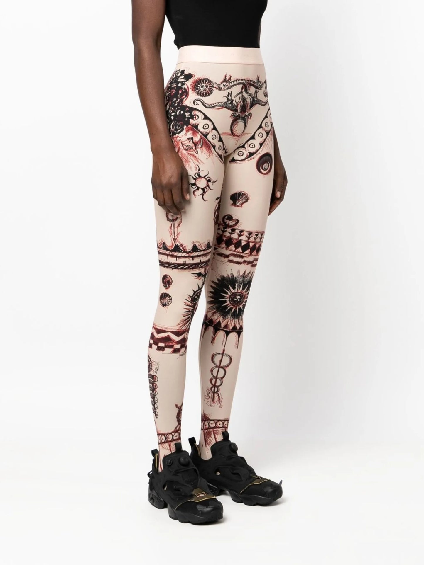 Geotic tattoo-print leggings