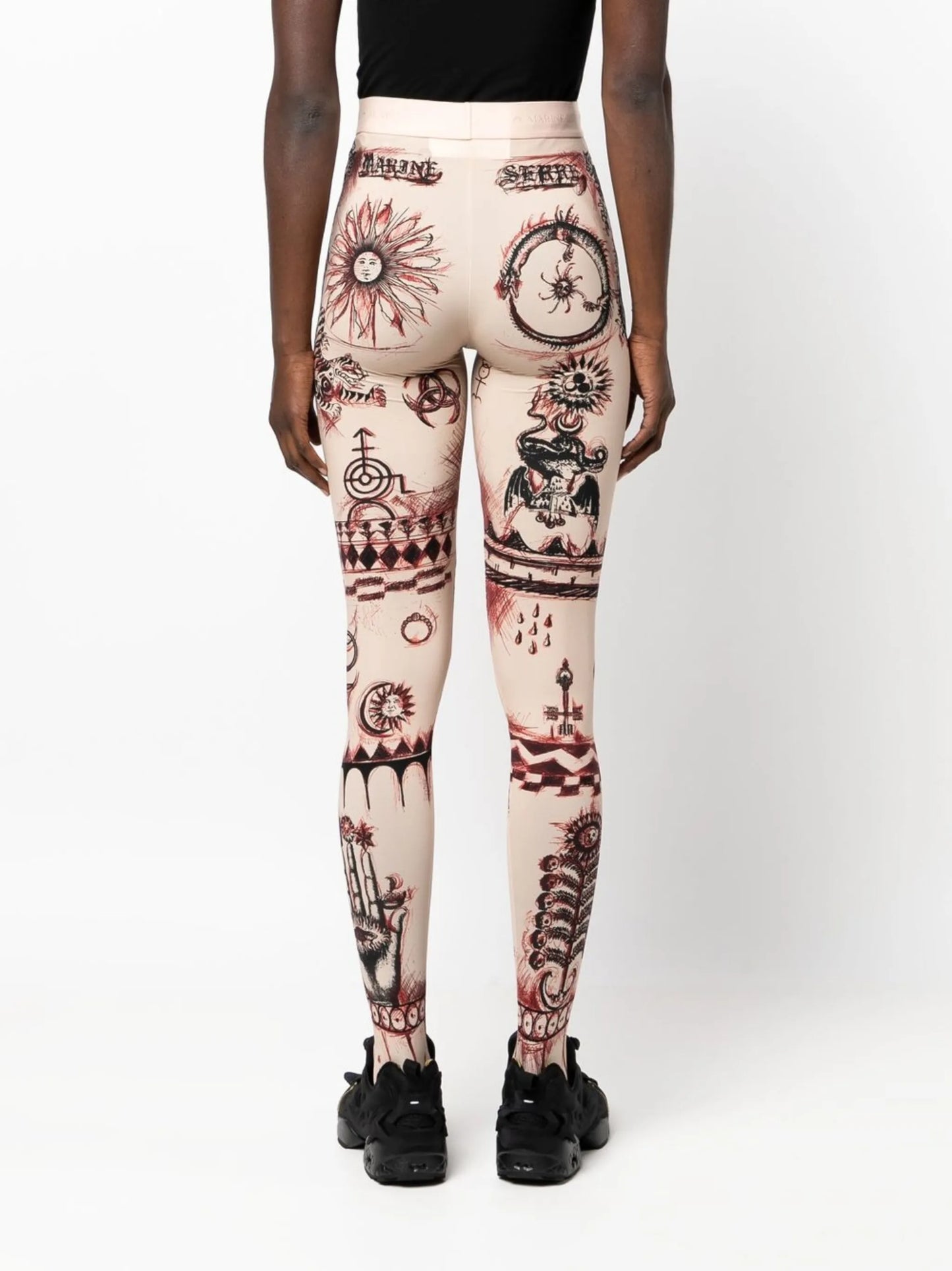 Geotic tattoo-print leggings