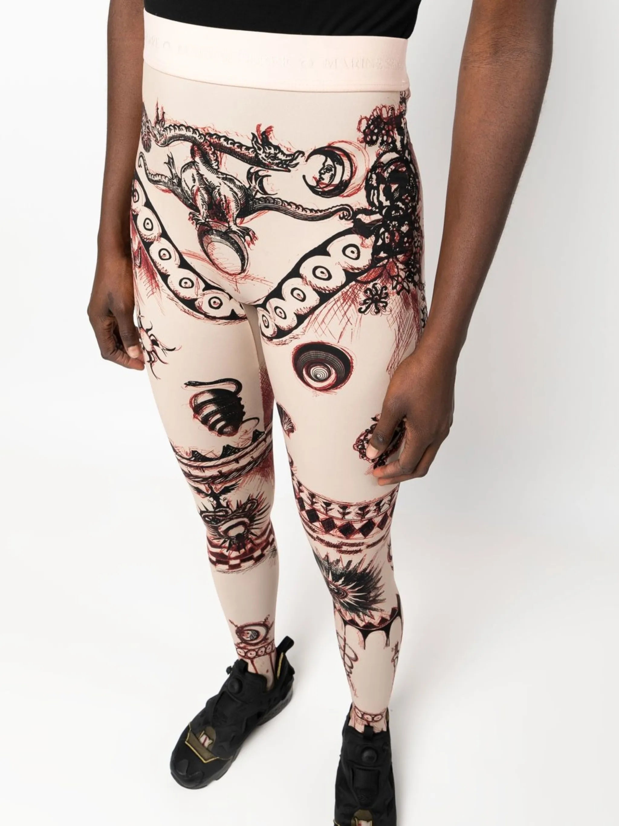 Geotic tattoo-print leggings