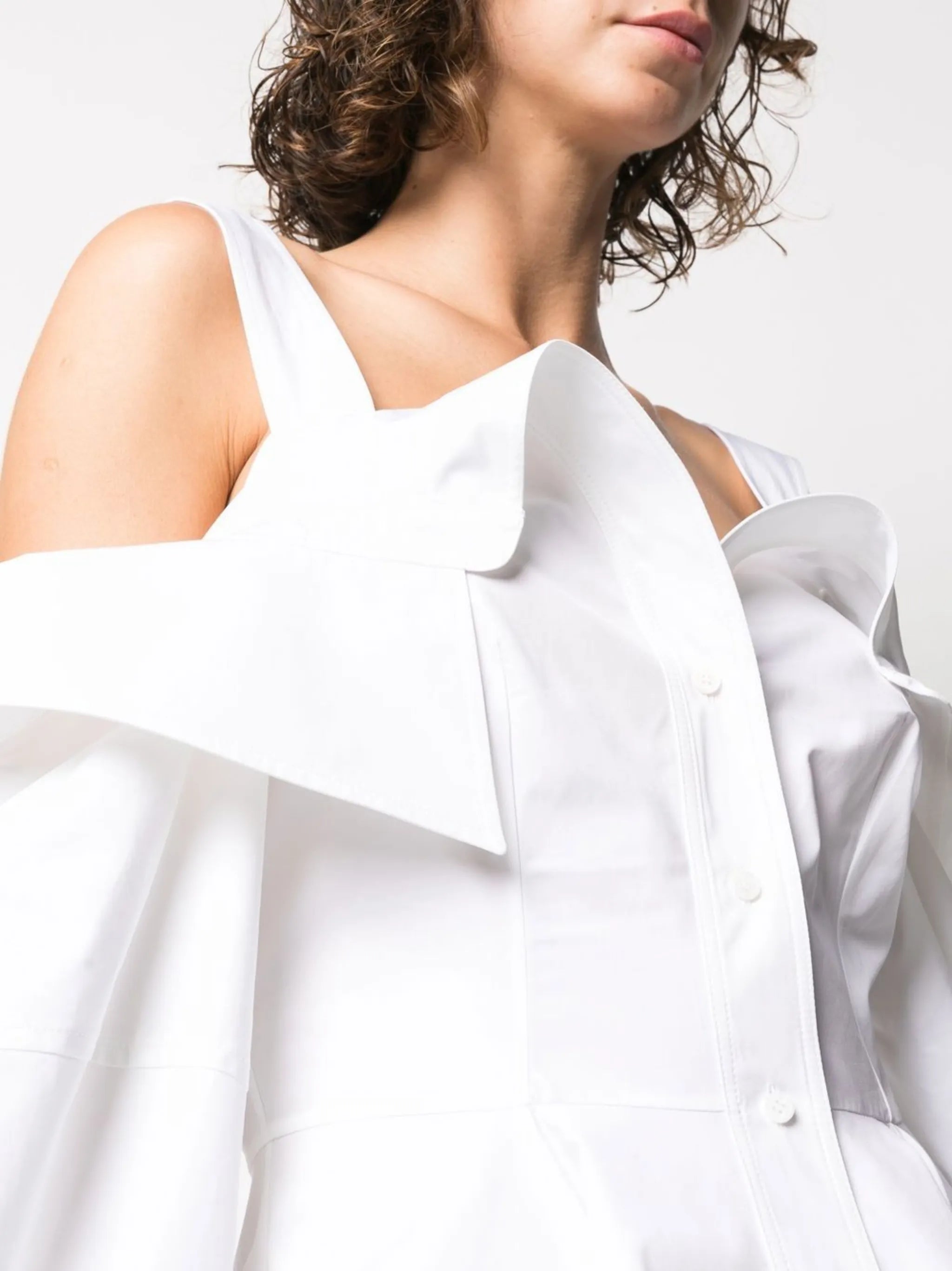 deconstructed peplum-hem shirt
