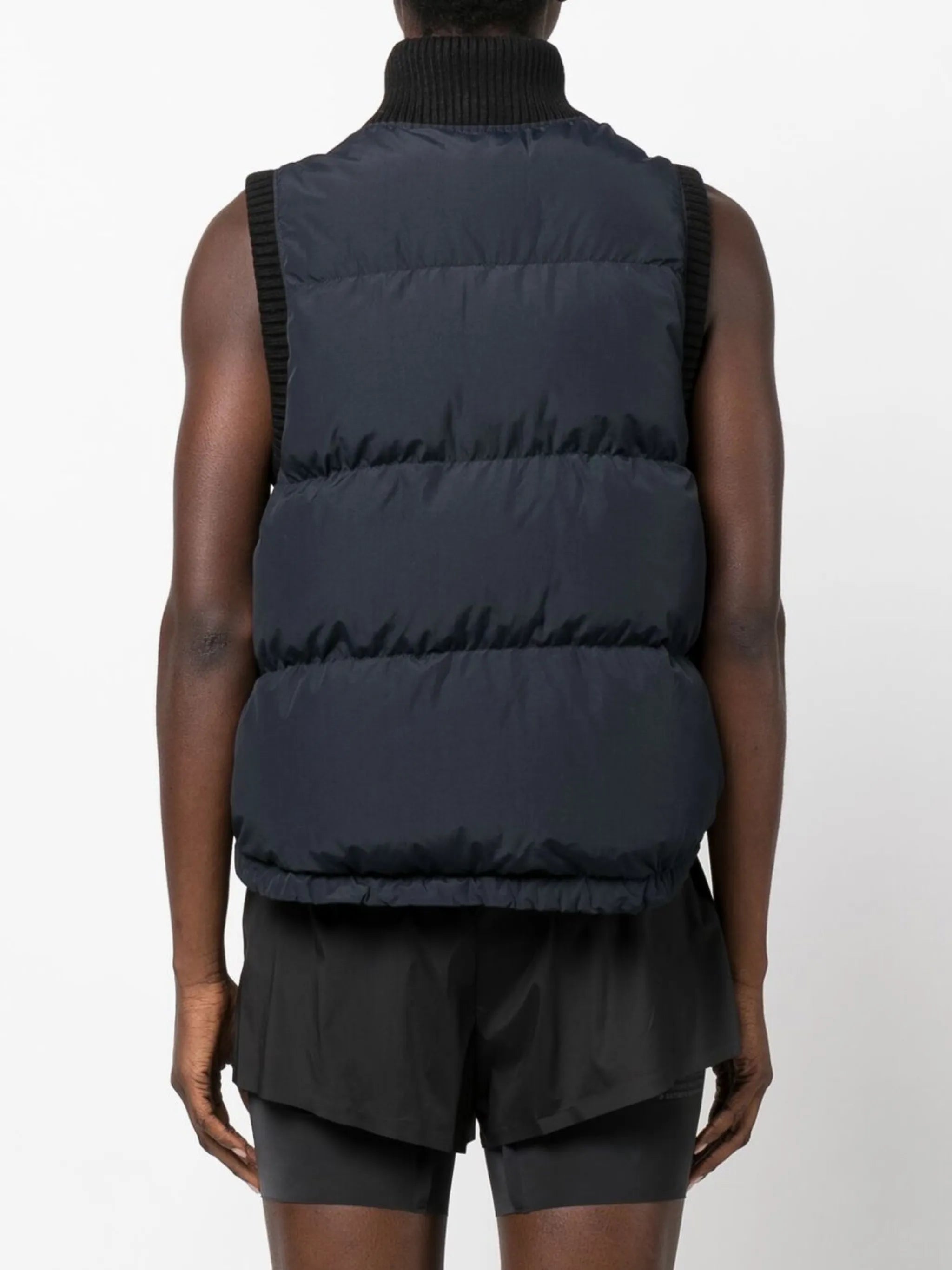 zip-fastening sleeveless jacket