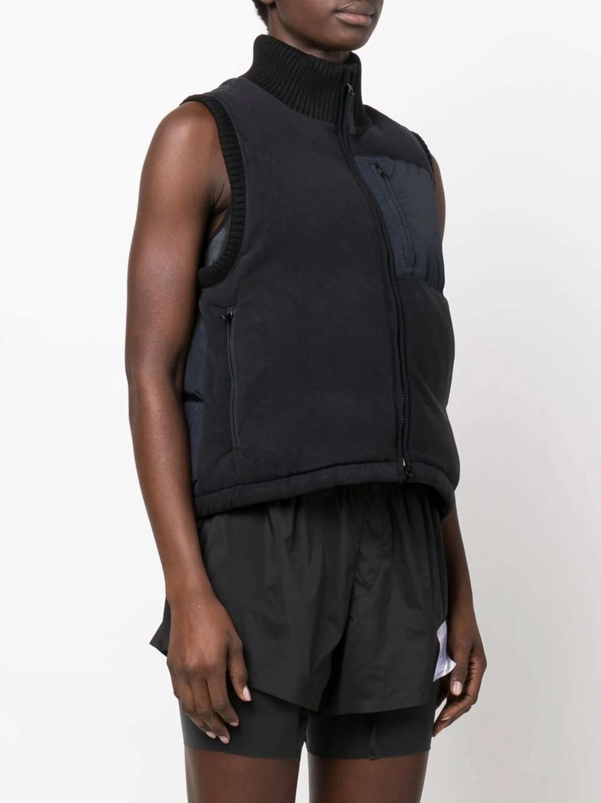 zip-fastening sleeveless jacket