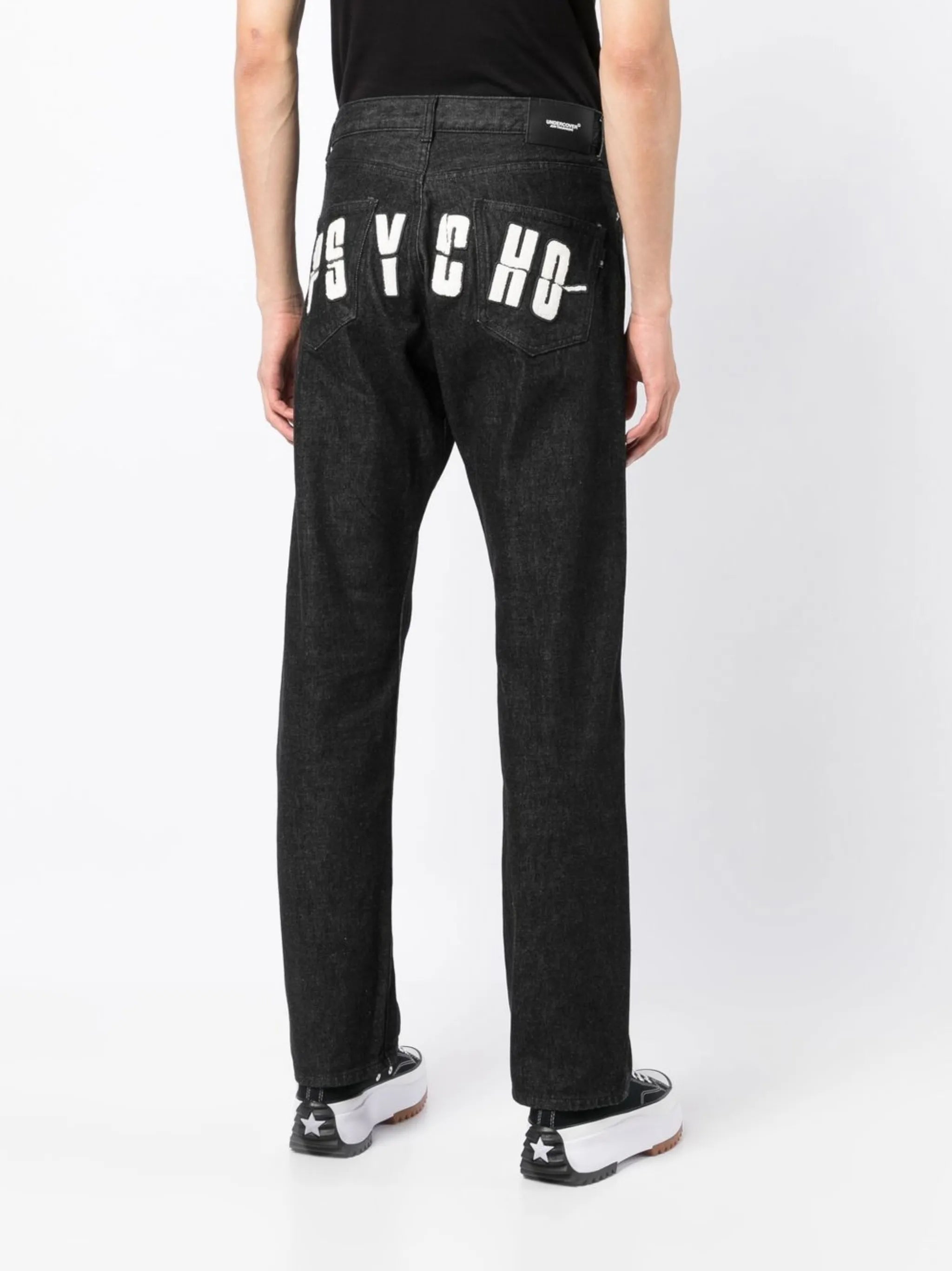 x Psycho logo-appliqué jeans