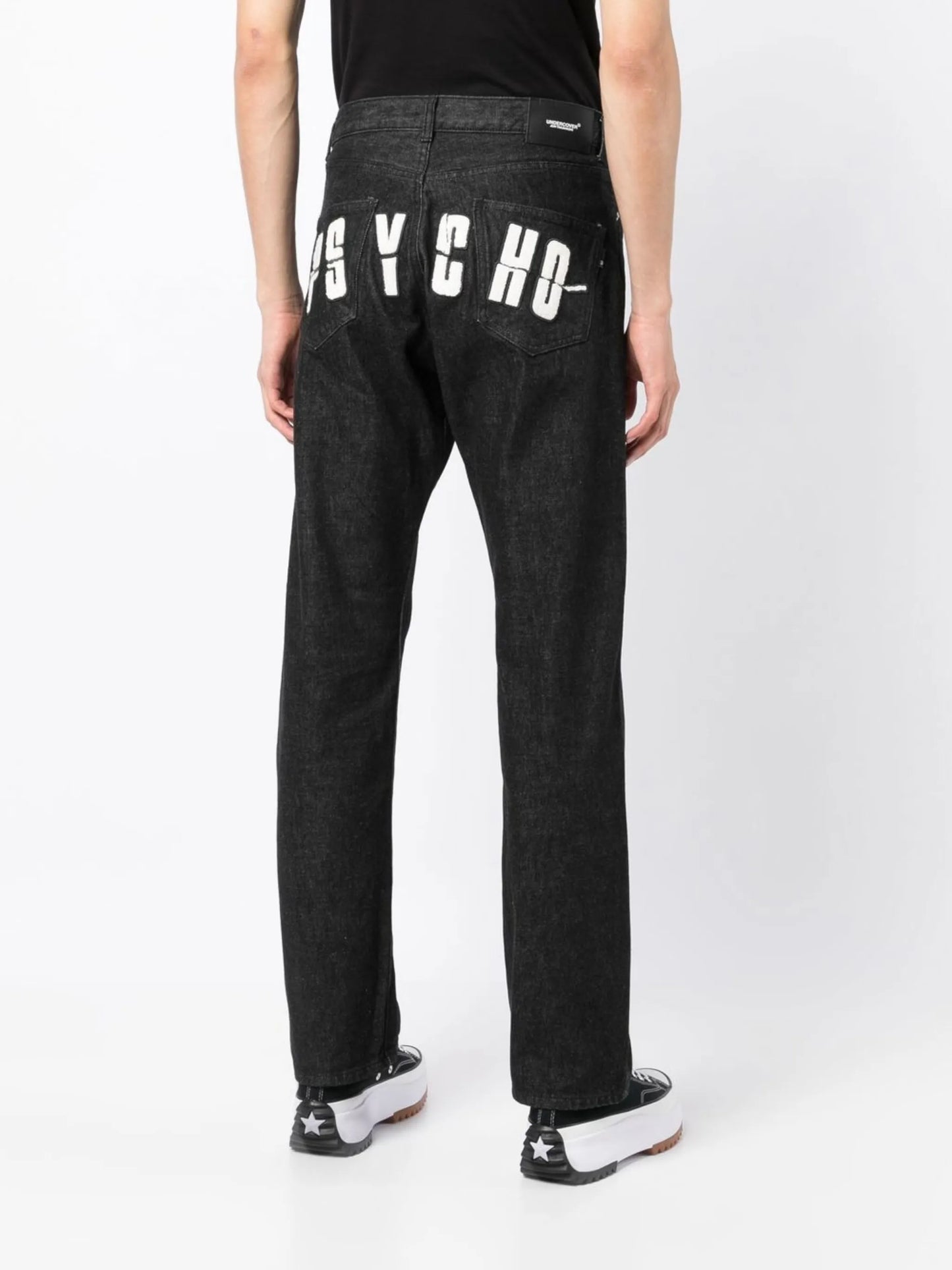 x Psycho logo-appliqué jeans