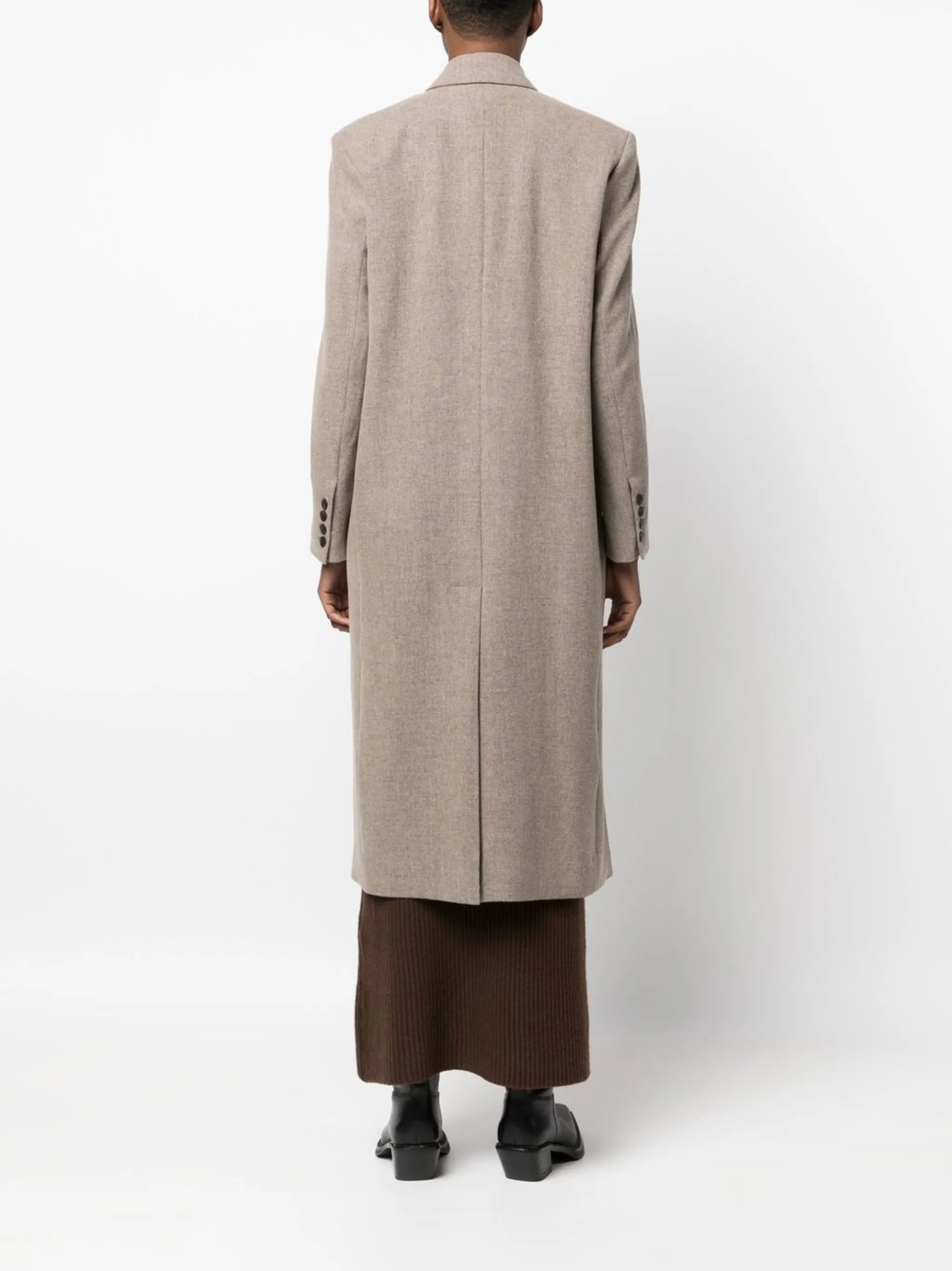 buttoned-up double-breasted coat