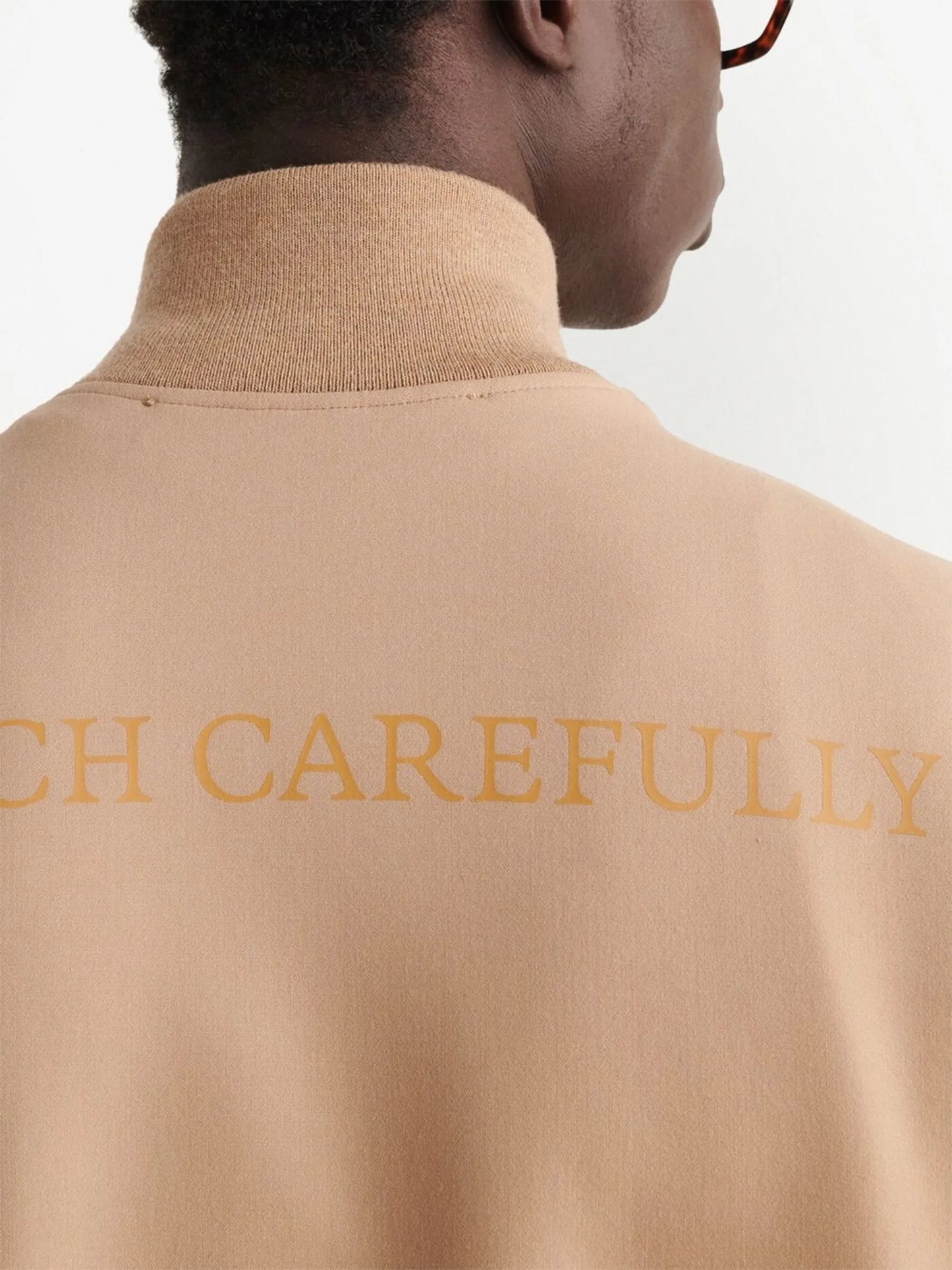 Quote-motif track jacket