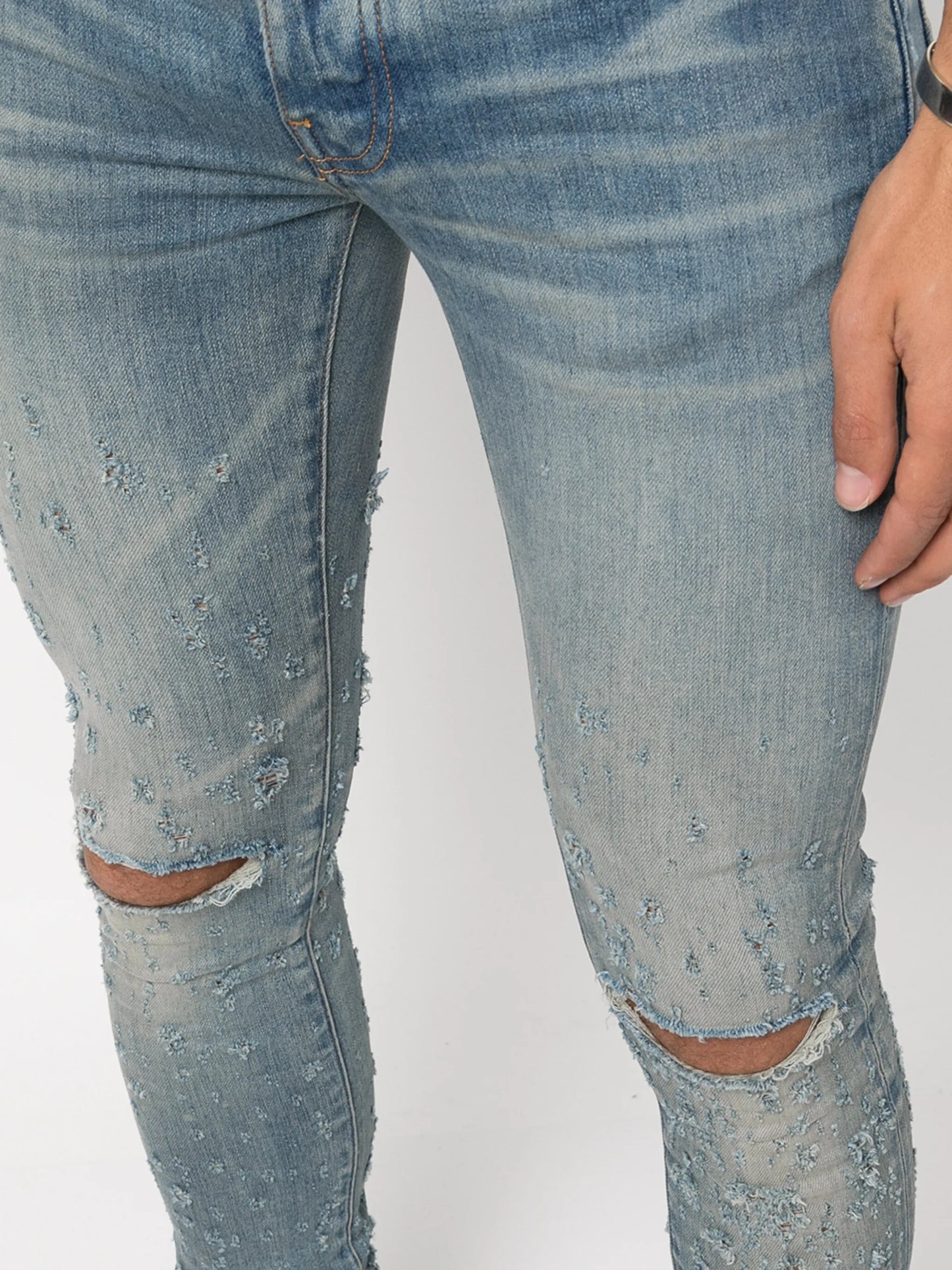 distressed skinny jeans