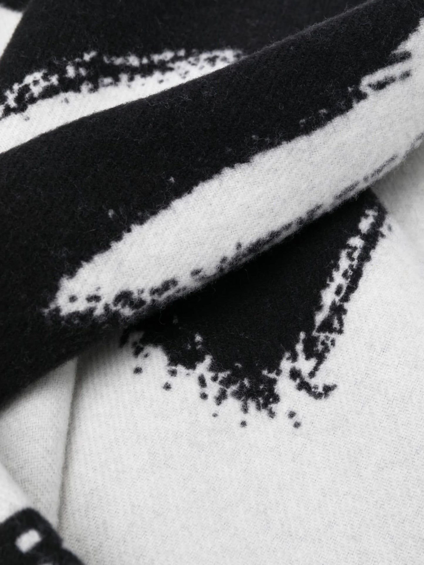 fringed knitted scarf