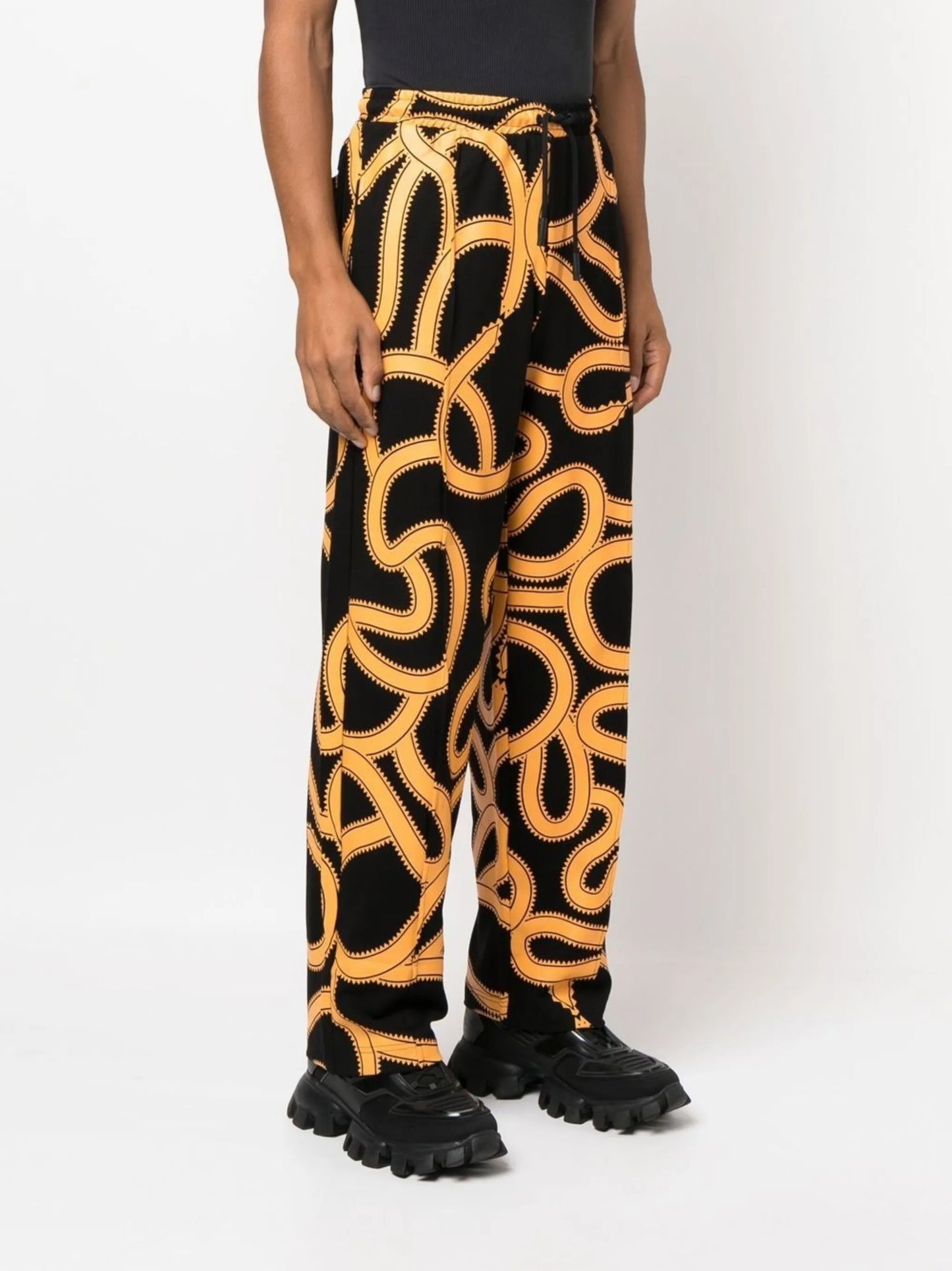 Snake-print track pants