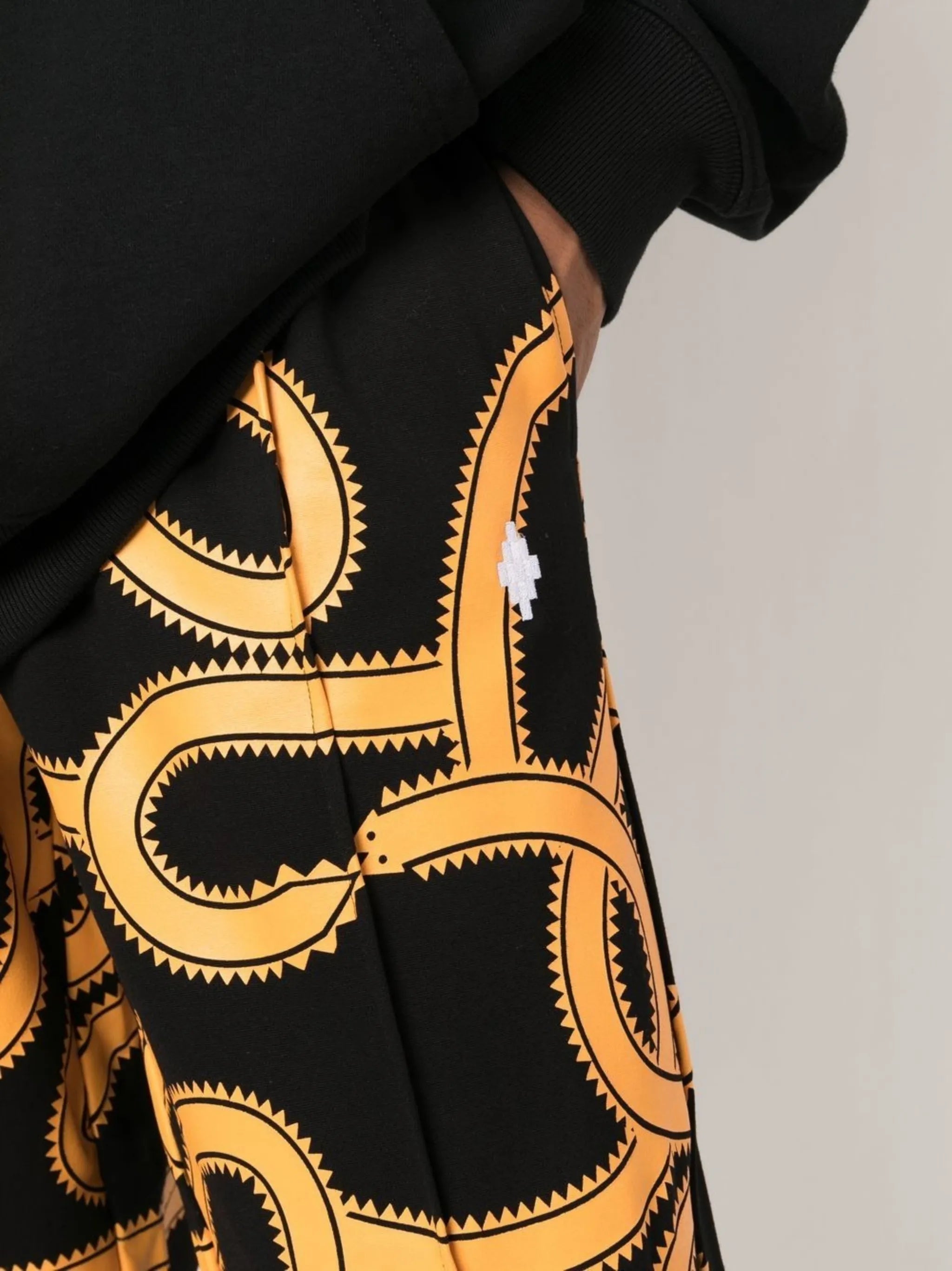 Snake-print track pants