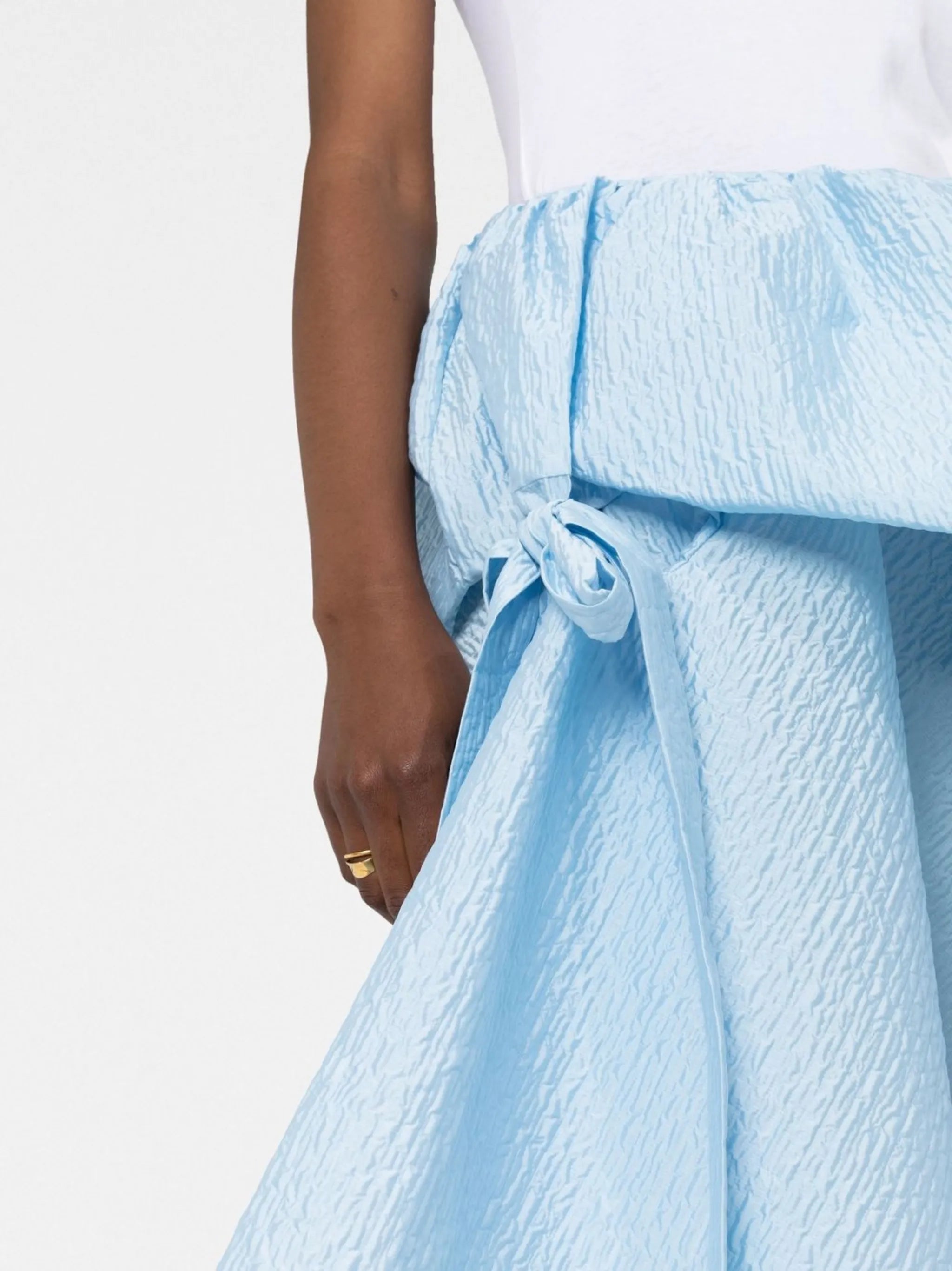 bow-embellished asymmetric skirt