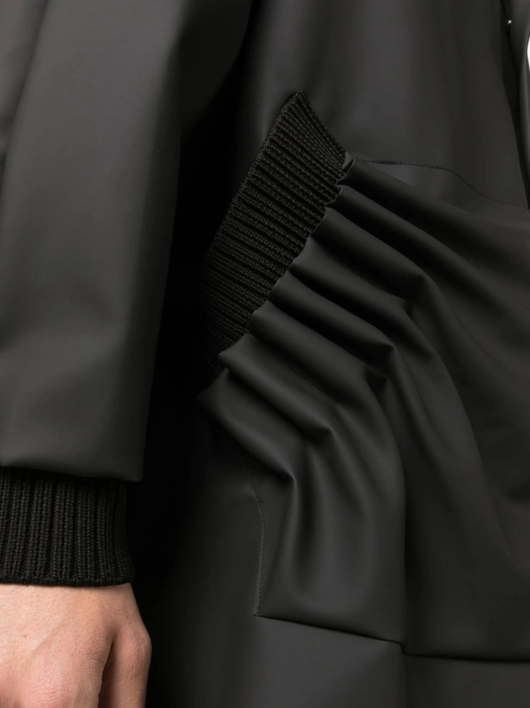 Tube Pleat raincoat