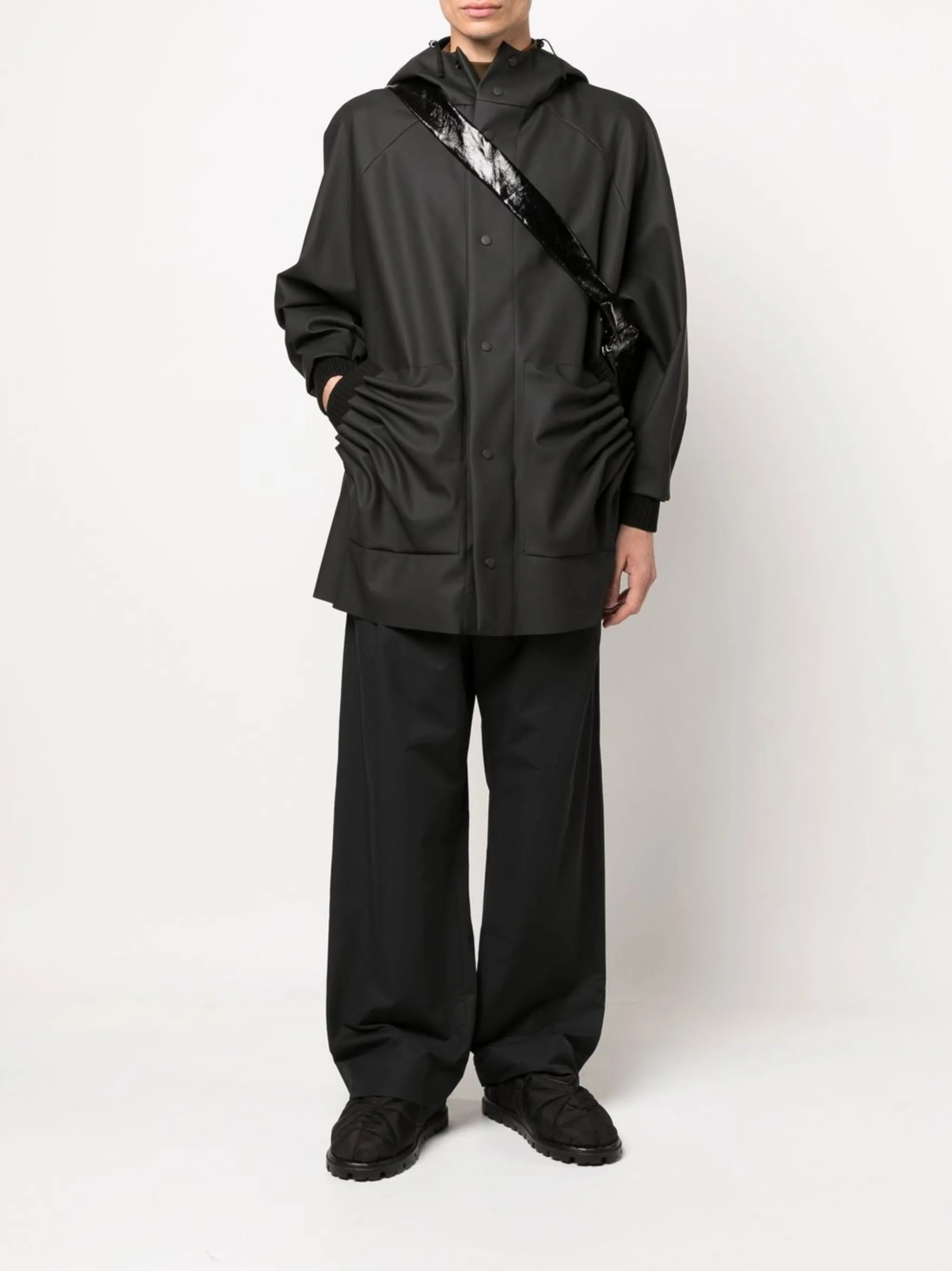 Tube Pleat raincoat