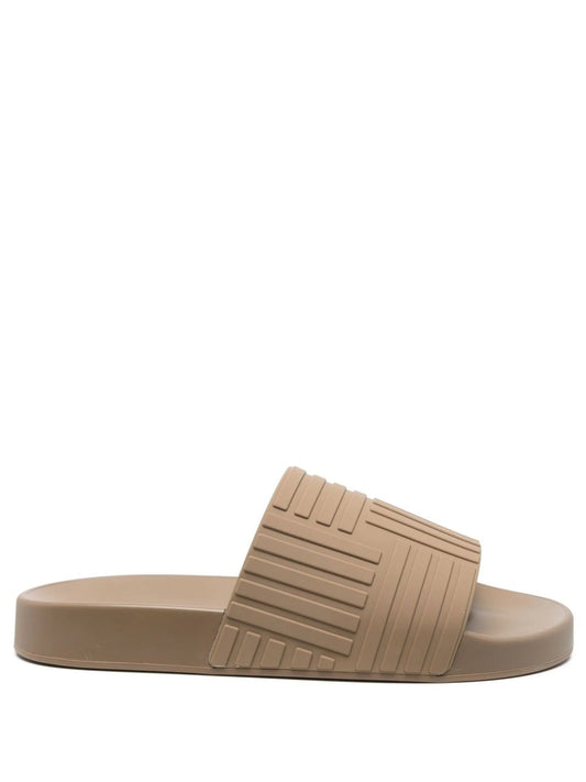 Intrecciato-embossed slides