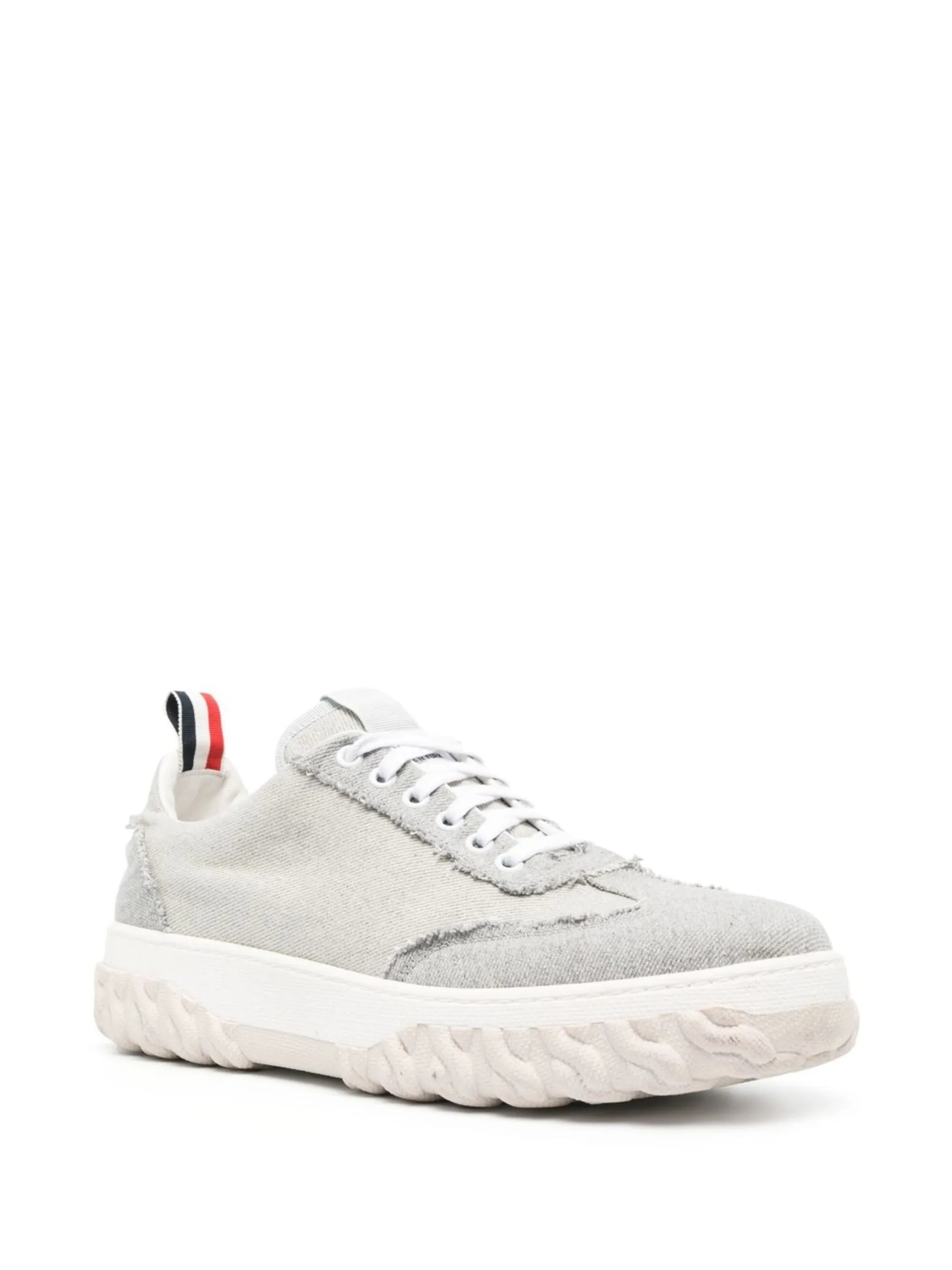 low-top frayed sneakers