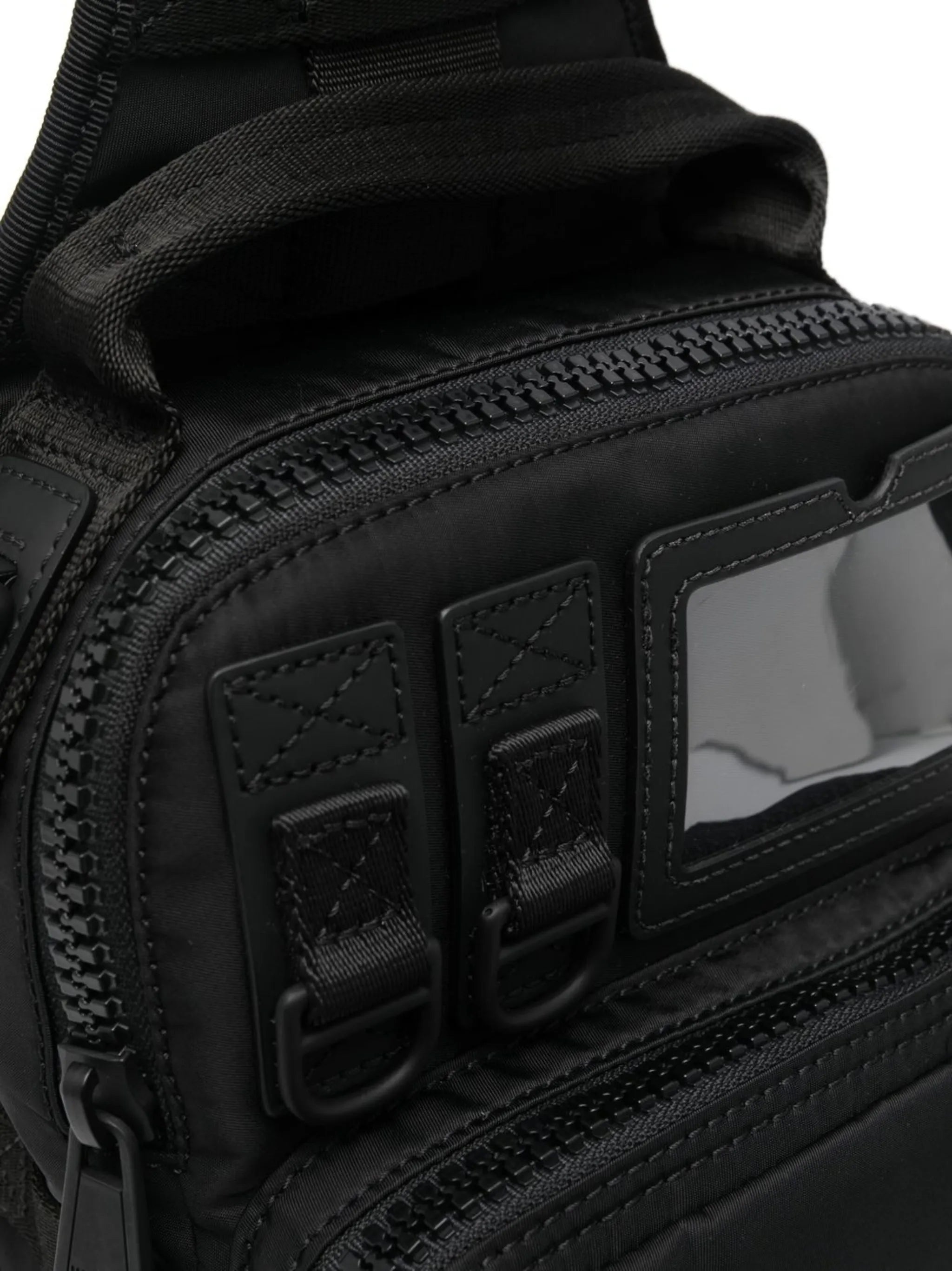multi-pocket crossbody backpack