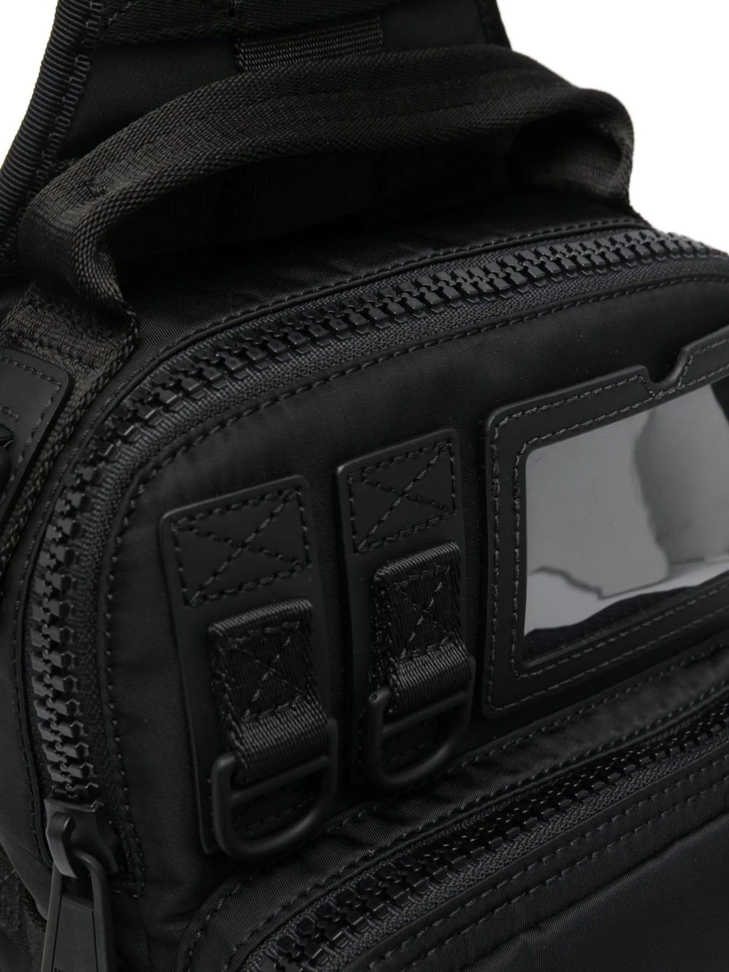 multi-pocket crossbody backpack