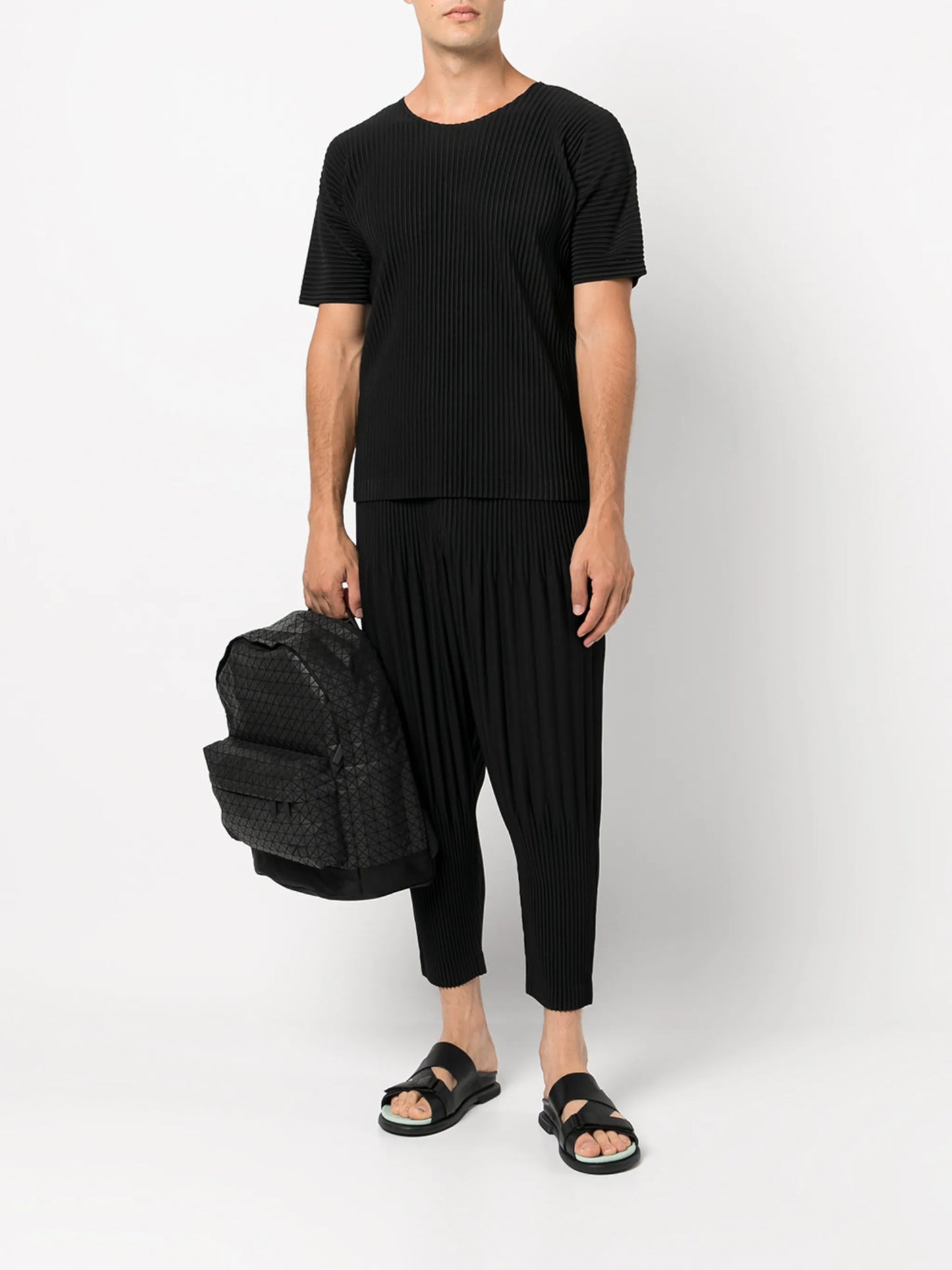 tapered-leg pleated trousers