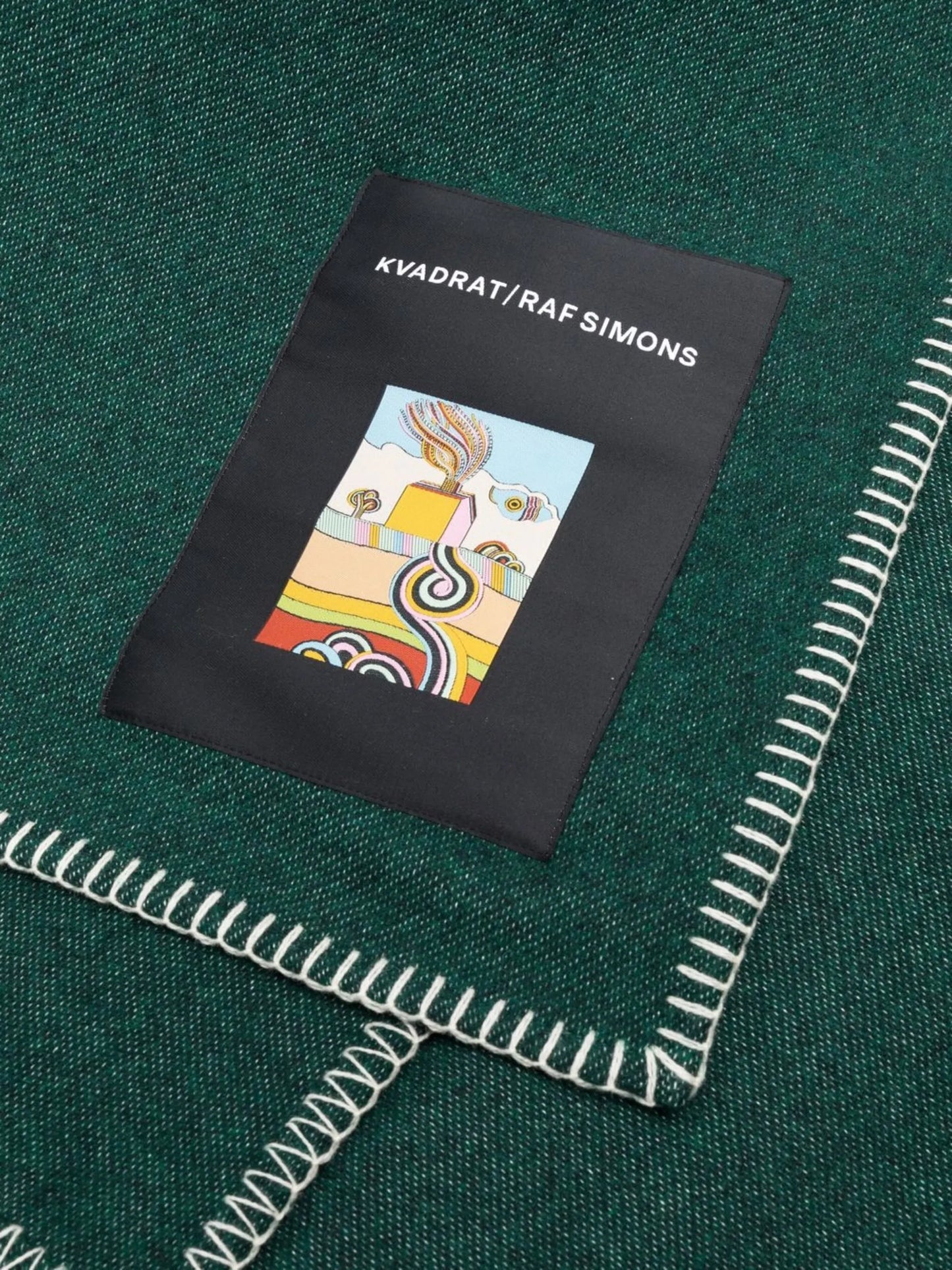 x Raf Simons whipstitch-trim throw
