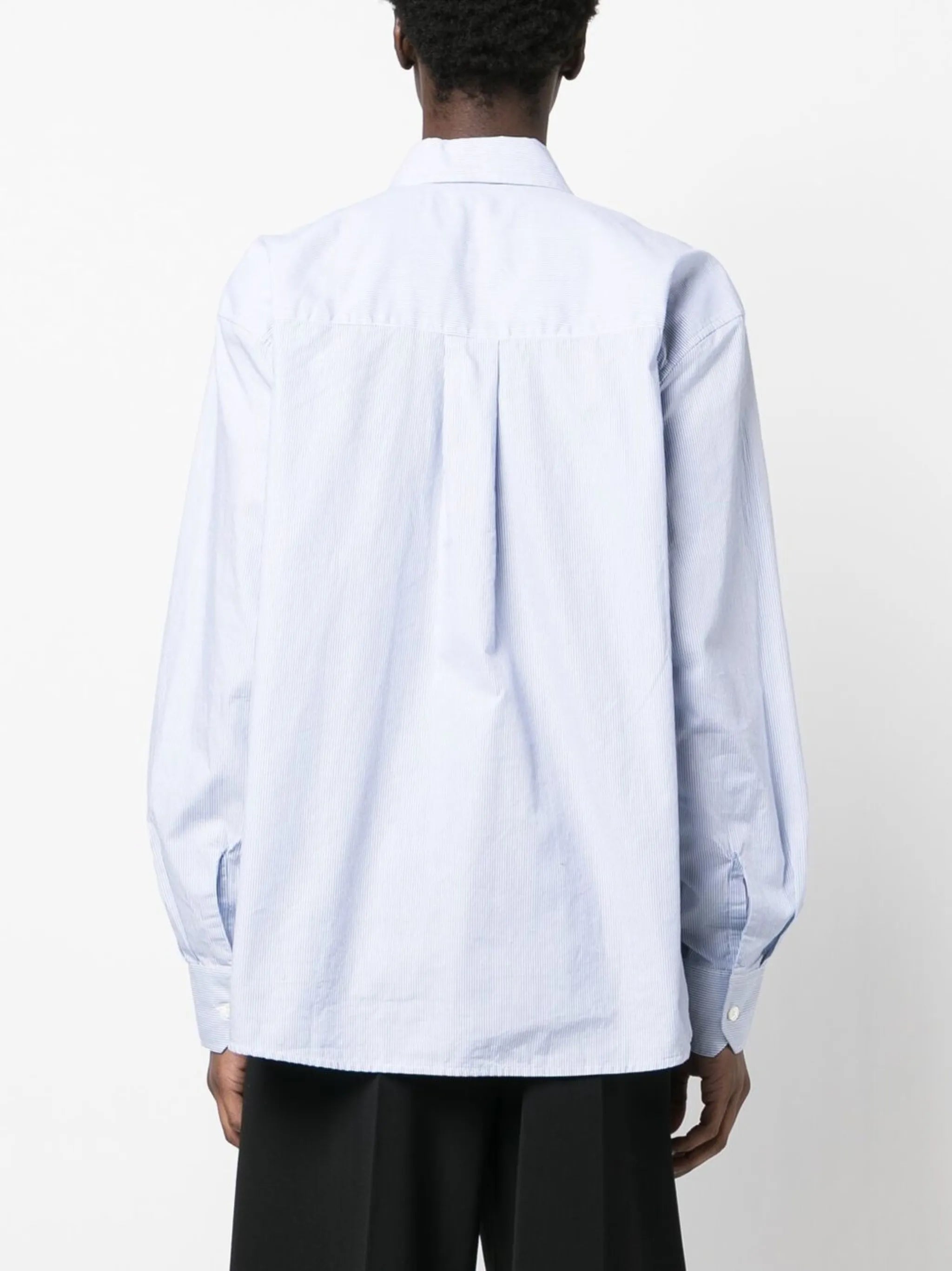 Above striped shirt