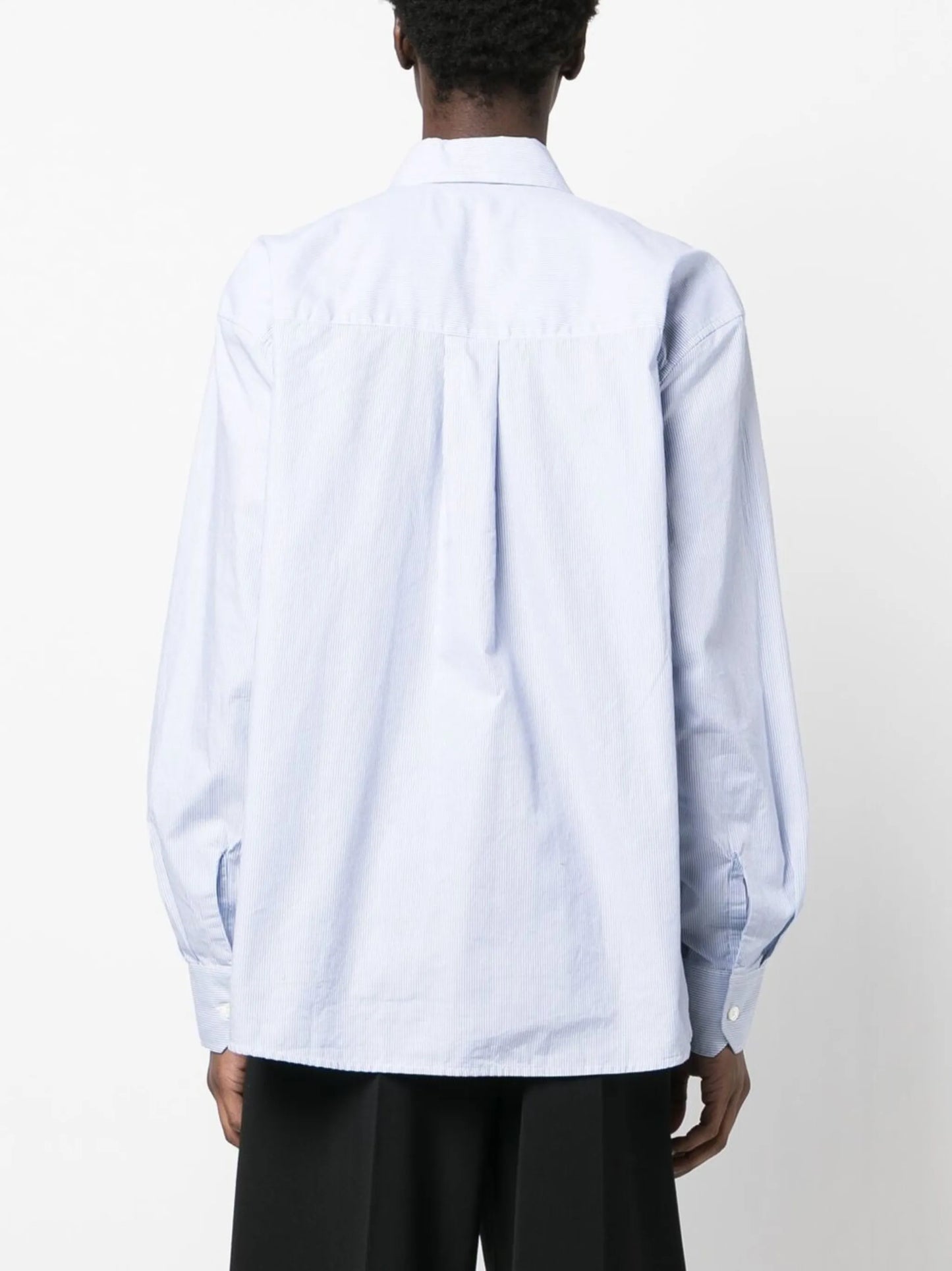 Above striped shirt