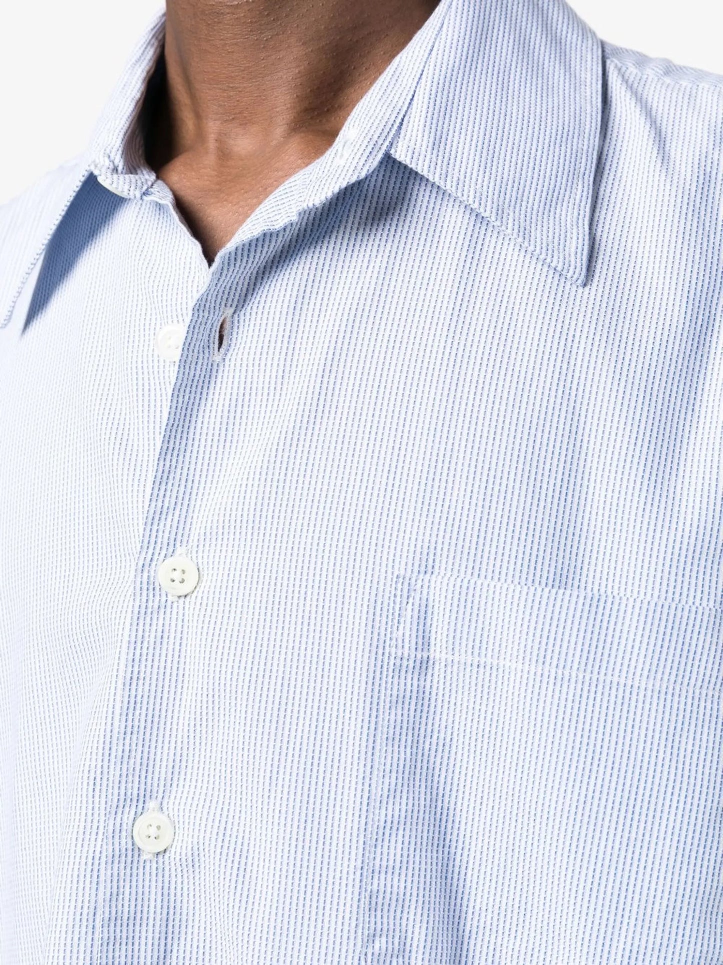 Above striped shirt