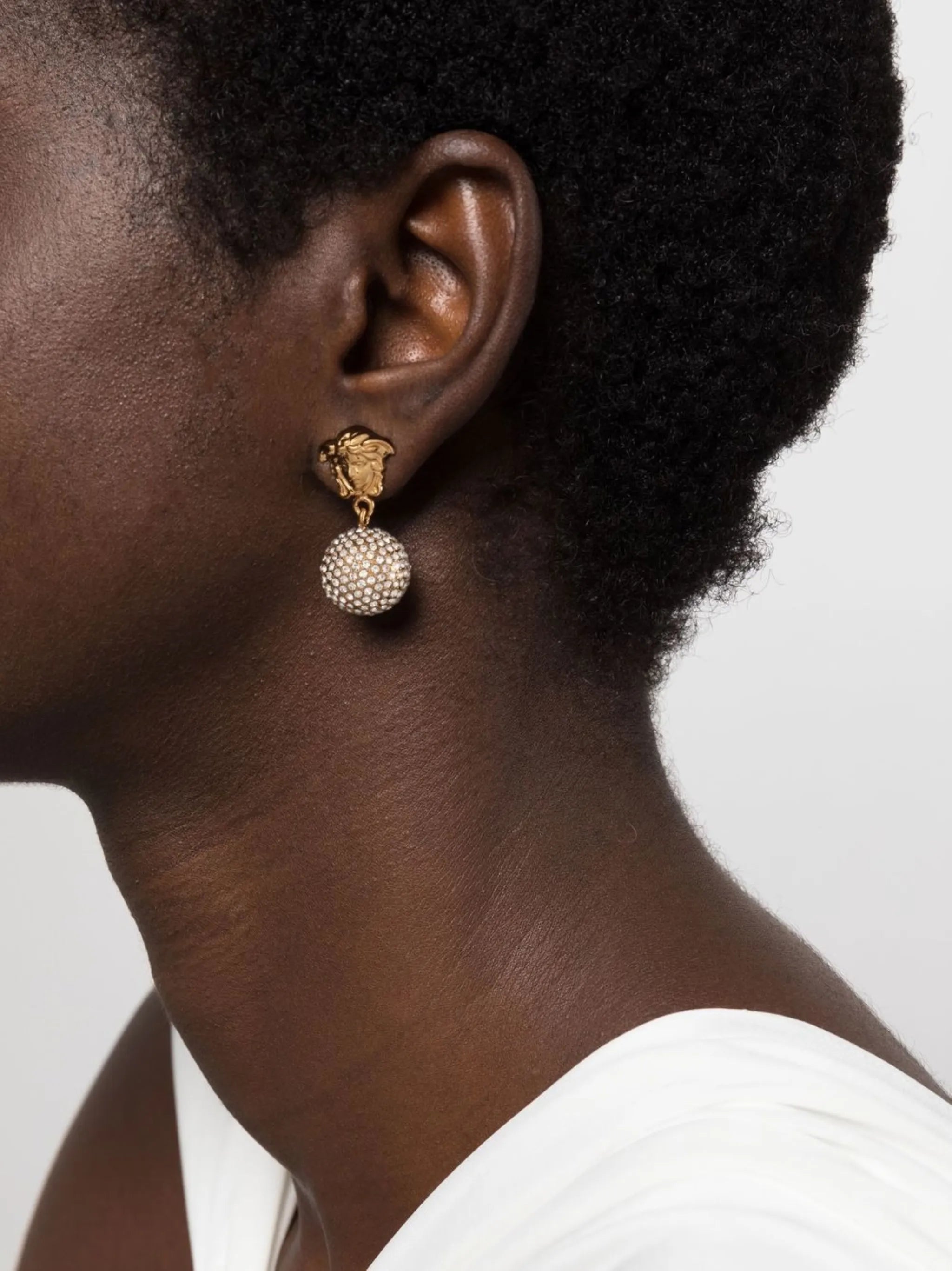Medusa crystal-embellished earrings