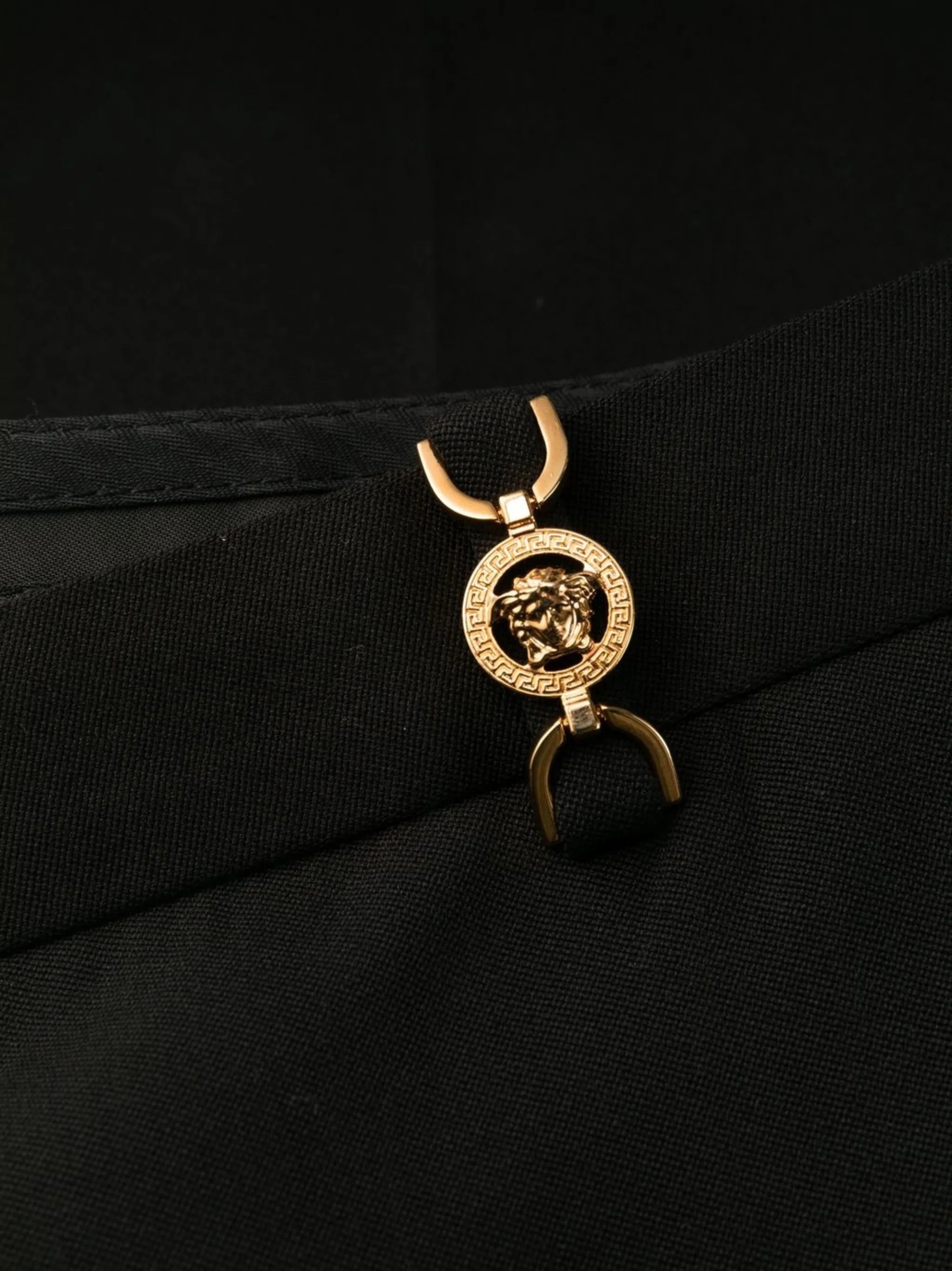 Medusa-plaque flared trousers