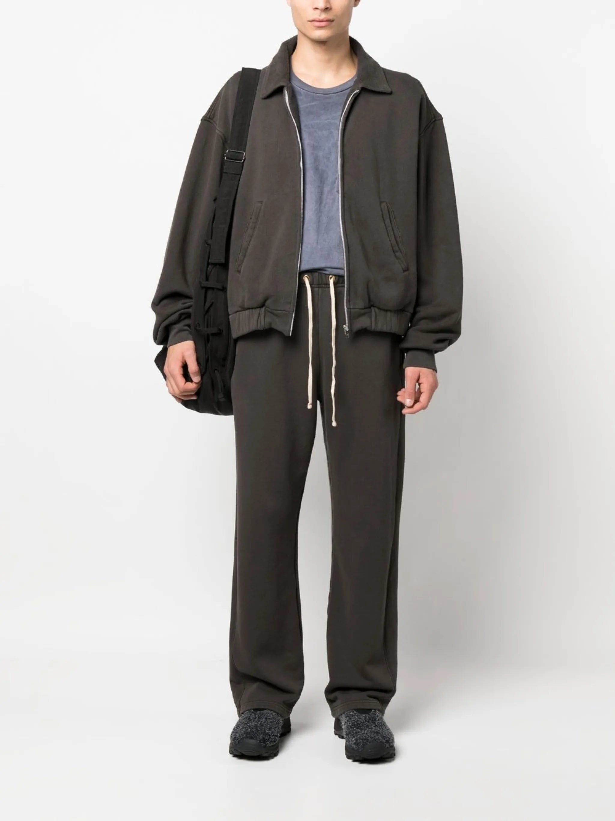 zipped-up sweat jacket