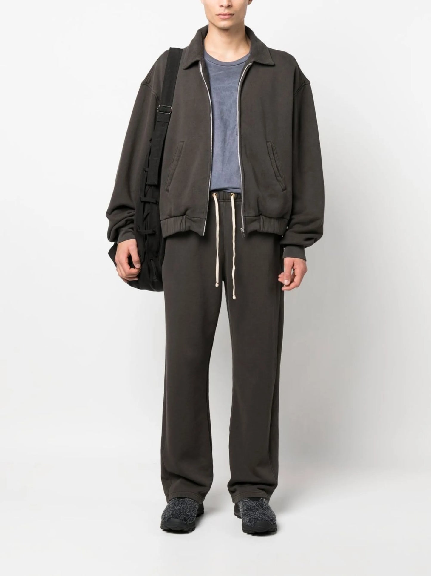 zipped-up sweat jacket