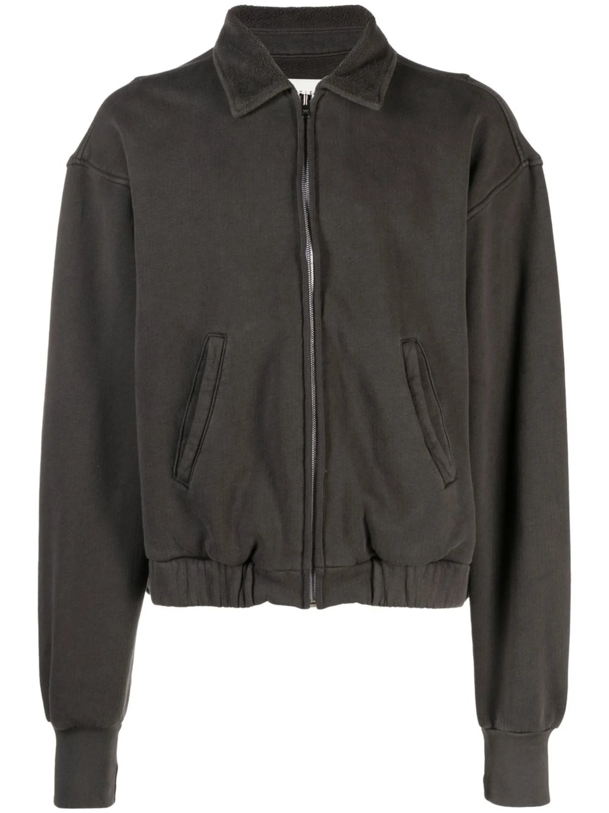 zipped-up sweat jacket