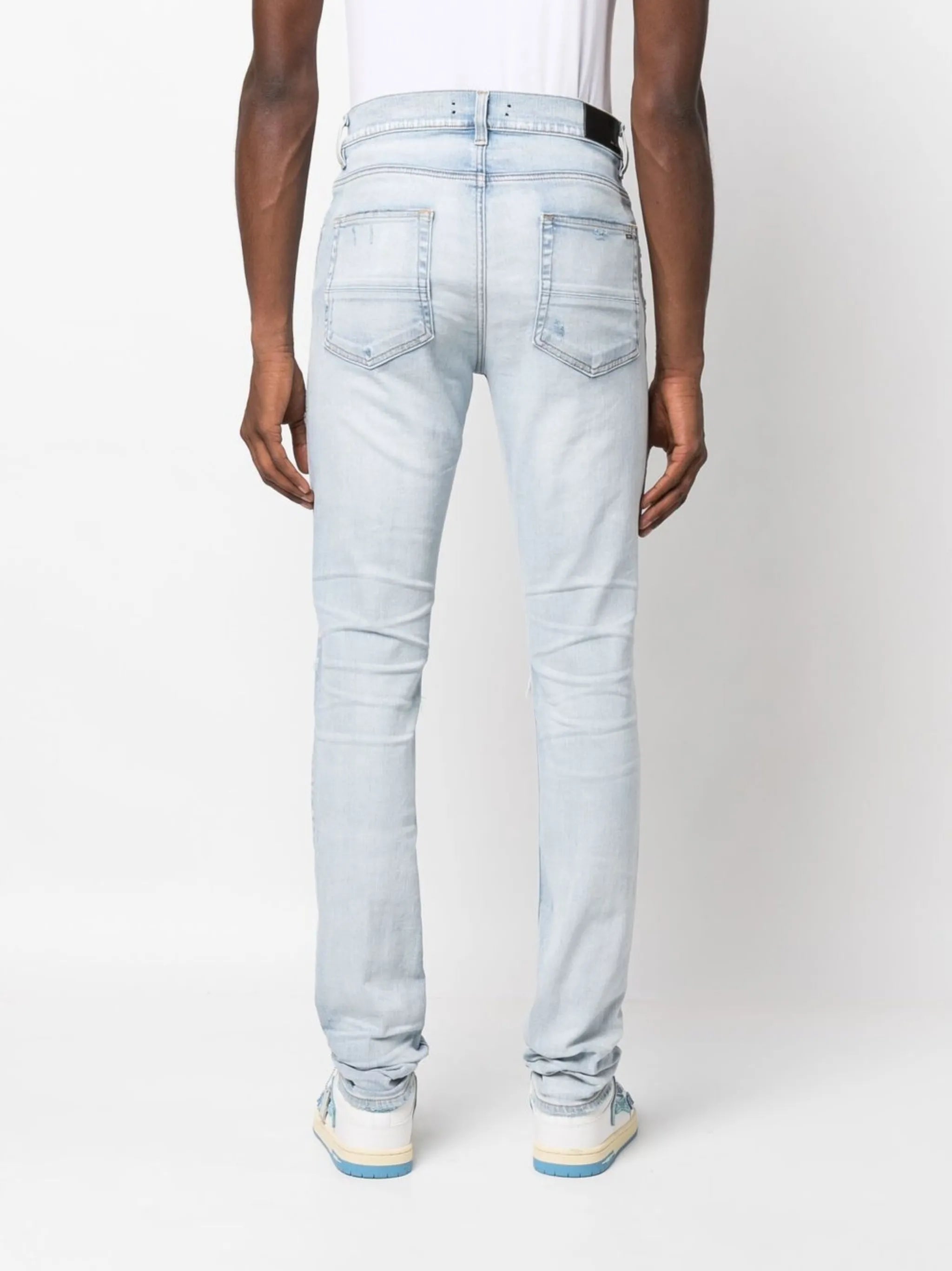 distressed slim-fit jeans