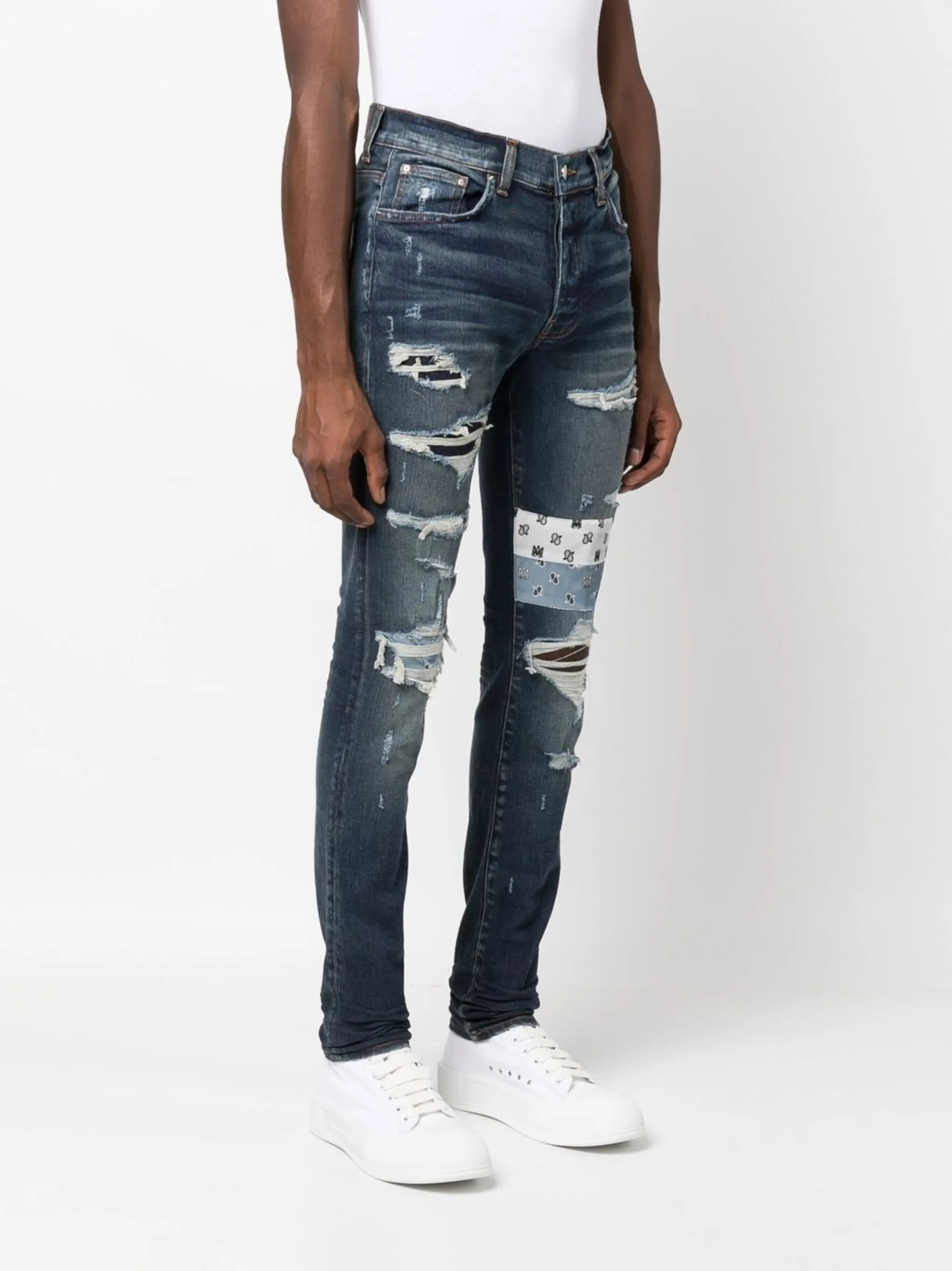 patchwork distressed slim jeans