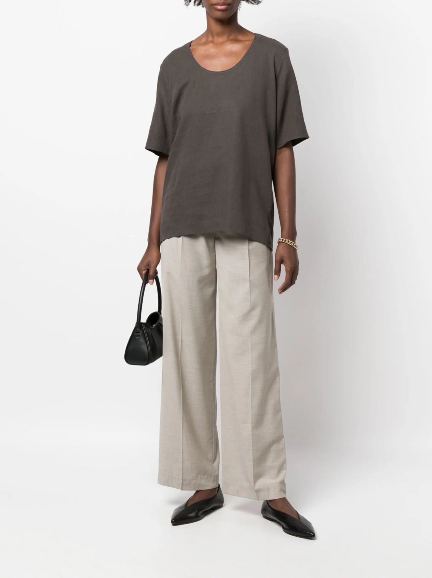 high-waisted pleated trousers