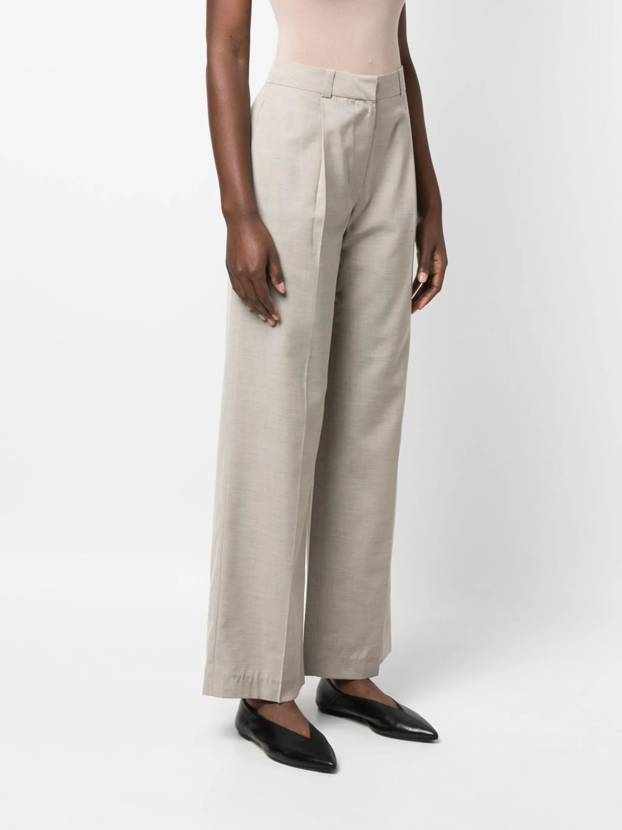 high-waisted pleated trousers