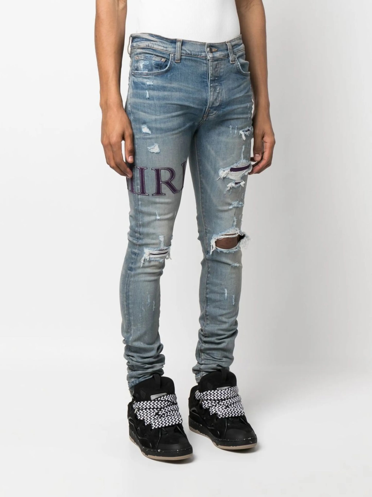 ripped-knee logo-print skinny jeans