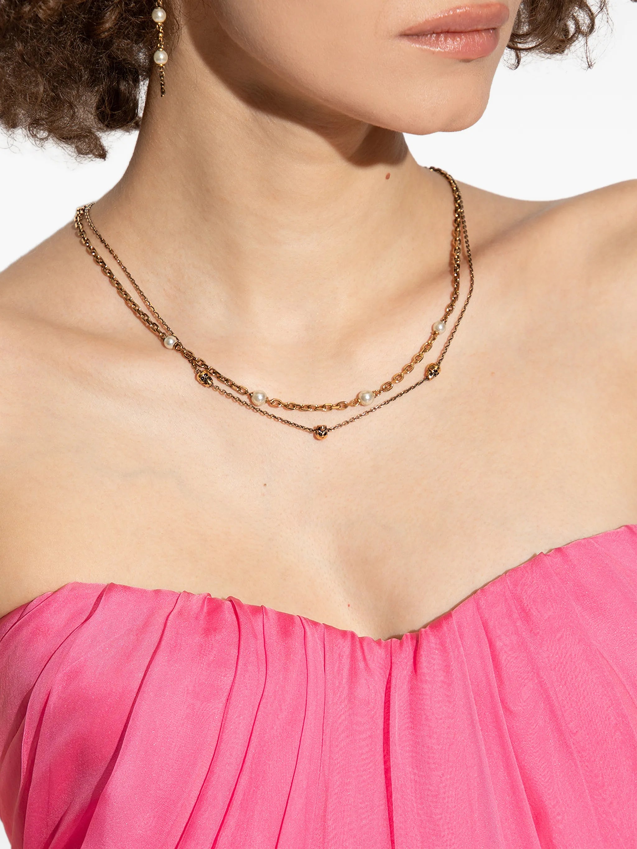 skull and pearl charm layered necklace