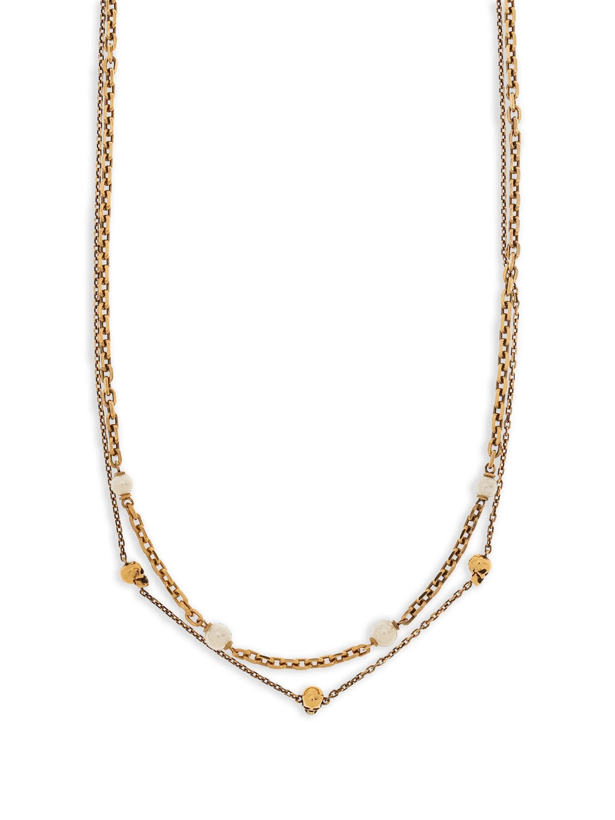 skull and pearl charm layered necklace