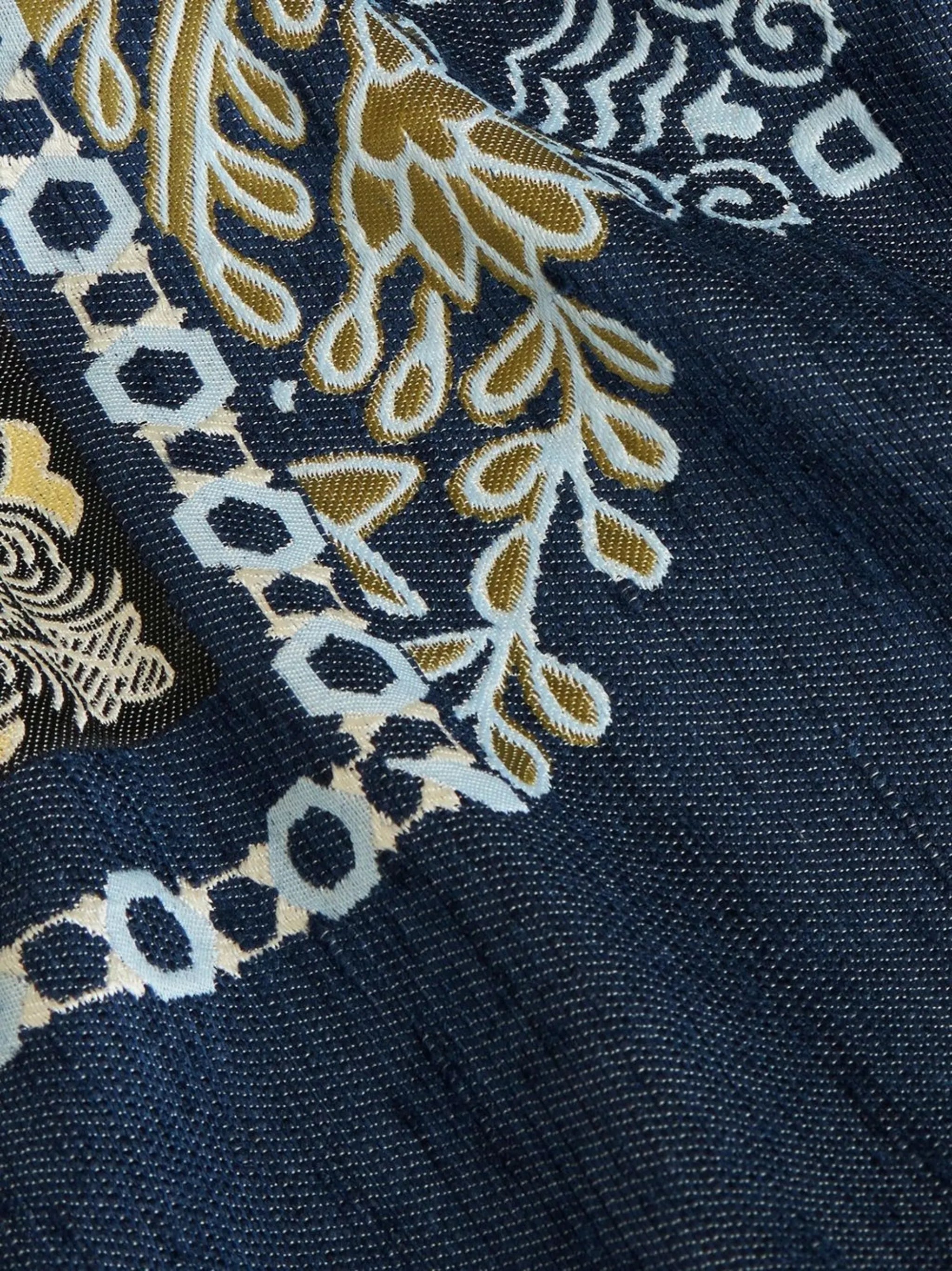 geometric-print denim cape