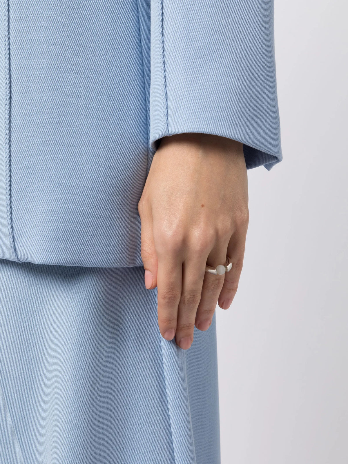 pearl-embellished polished ring