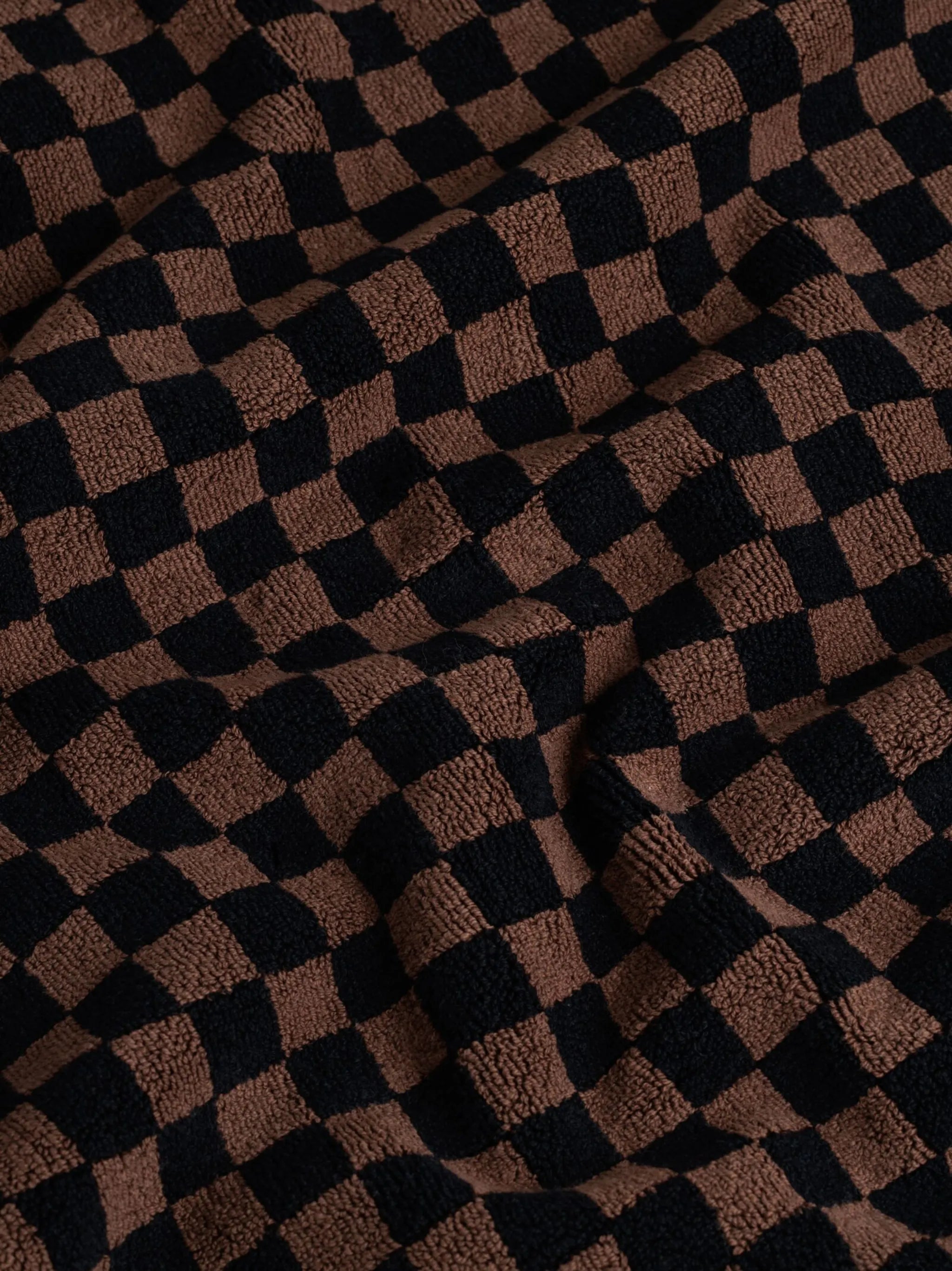 checkerboard-print bath mat