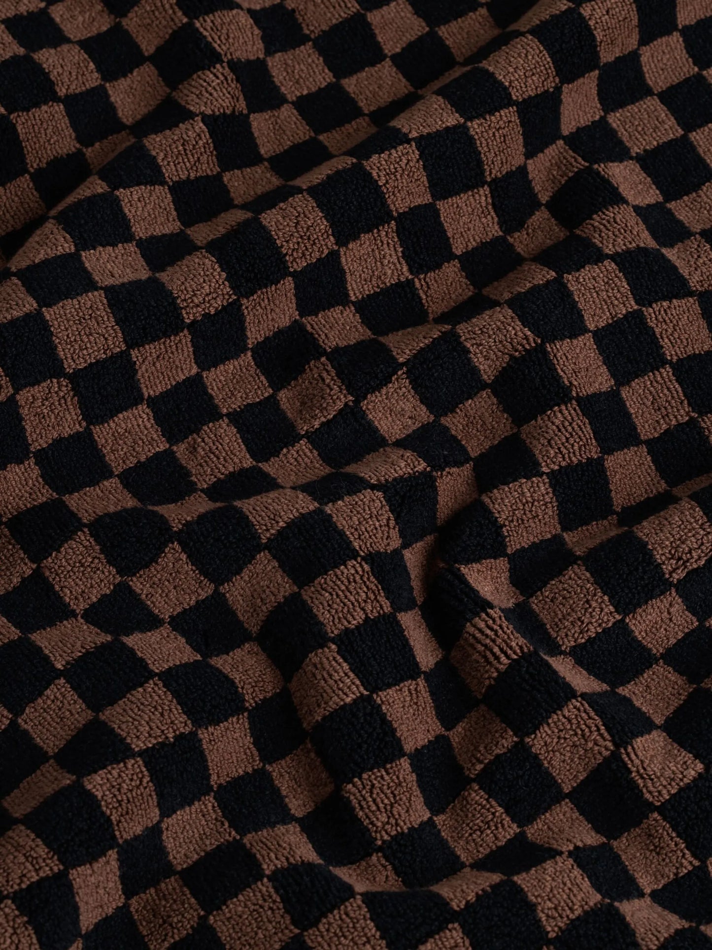 checkerboard-print bath mat