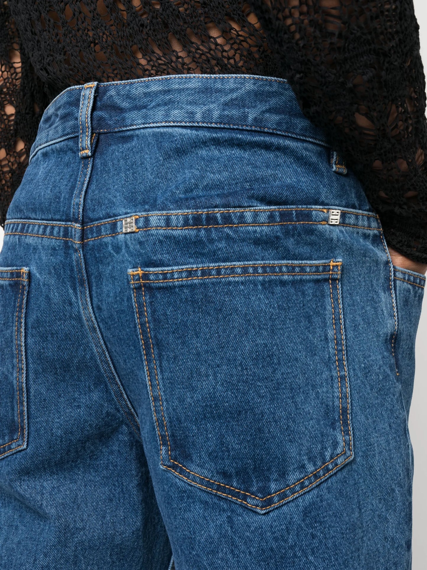 high-waisted ripped jeans