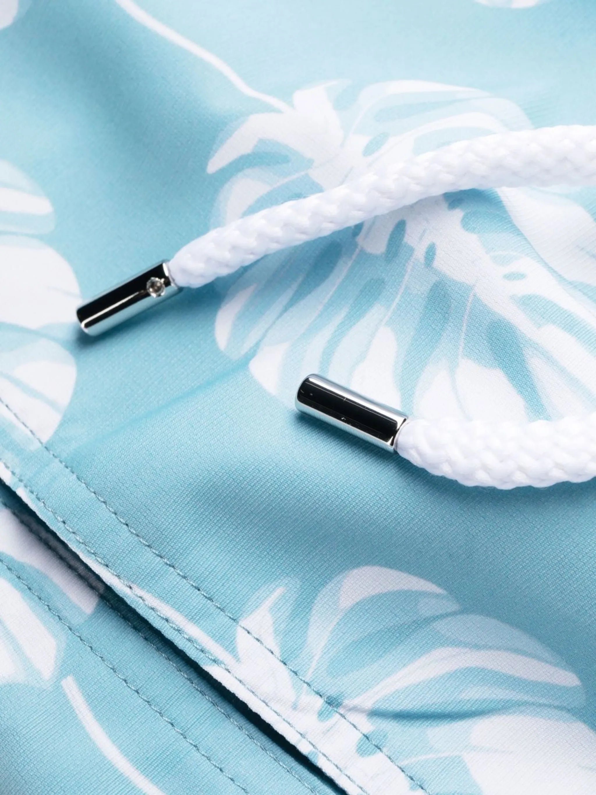 leaf-print swim shorts