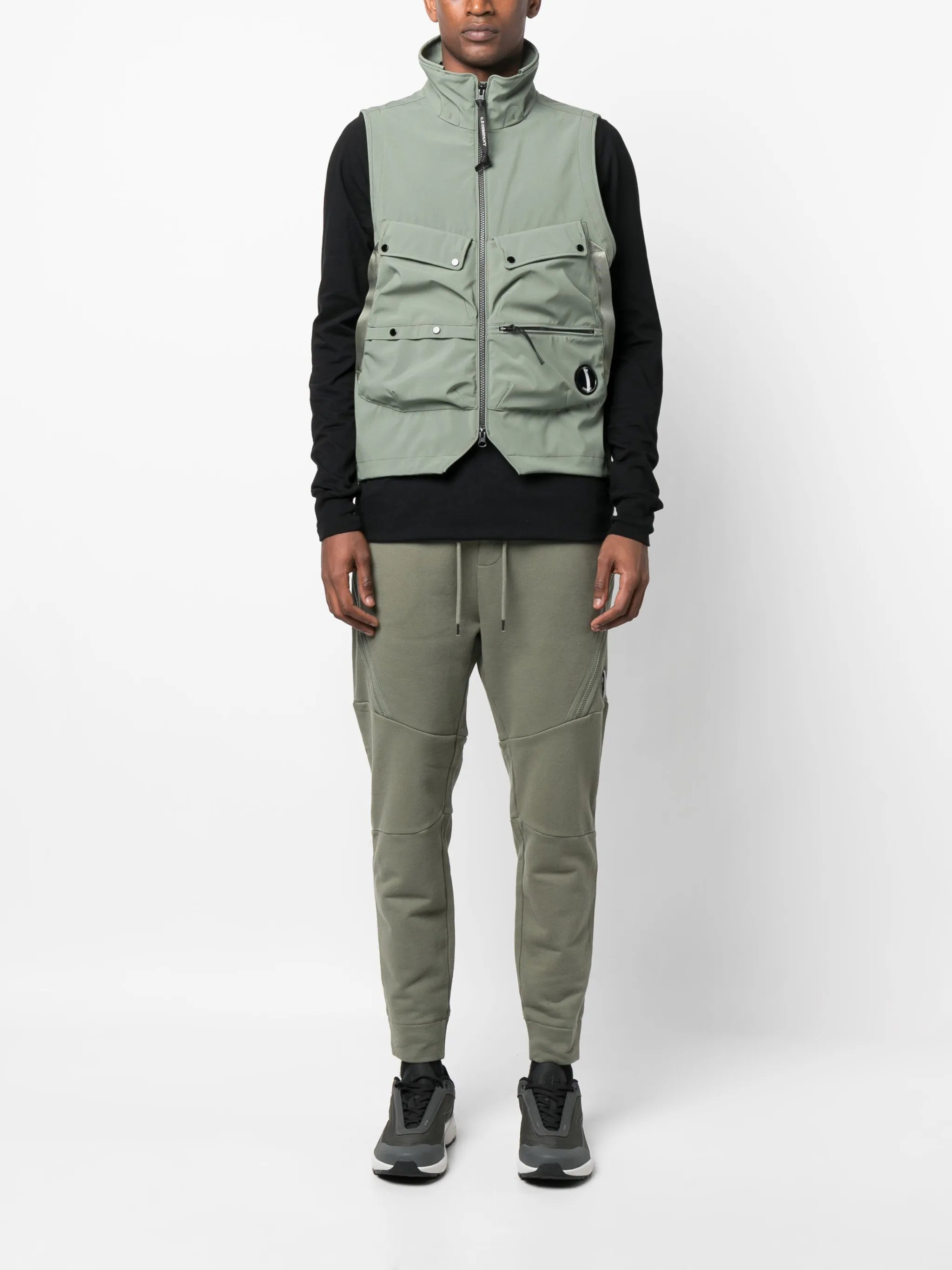 Lens-detail multi-pocket vest