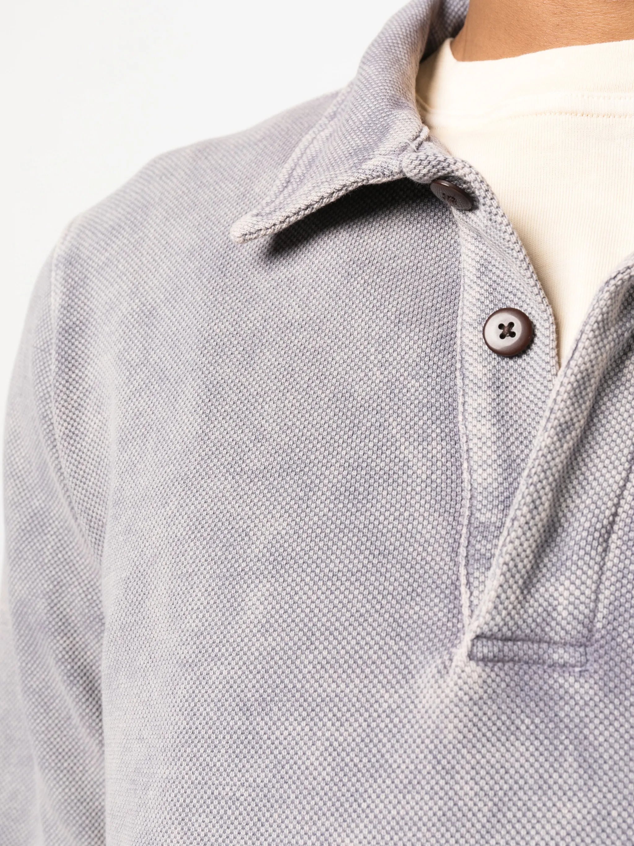 faded long-sleeved polo shirt