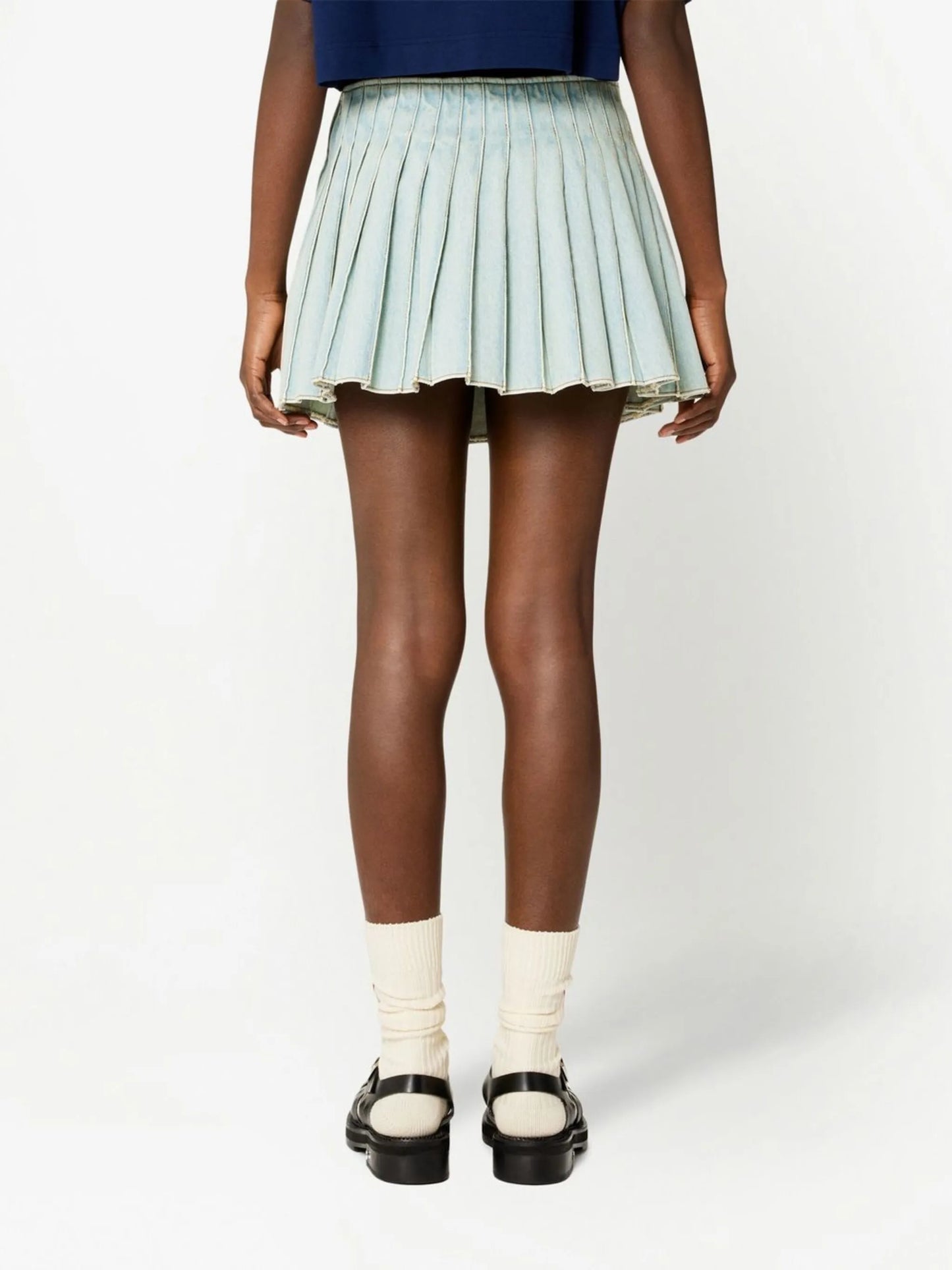pleated denim skirt